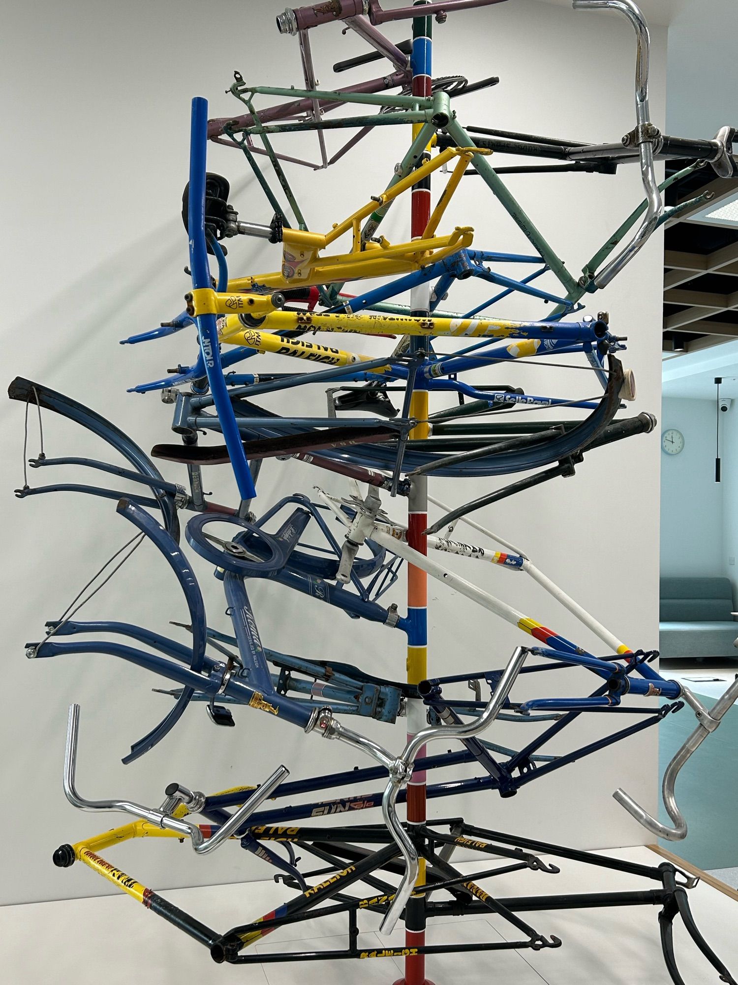 Sculpture made of bike frames stacked vertically