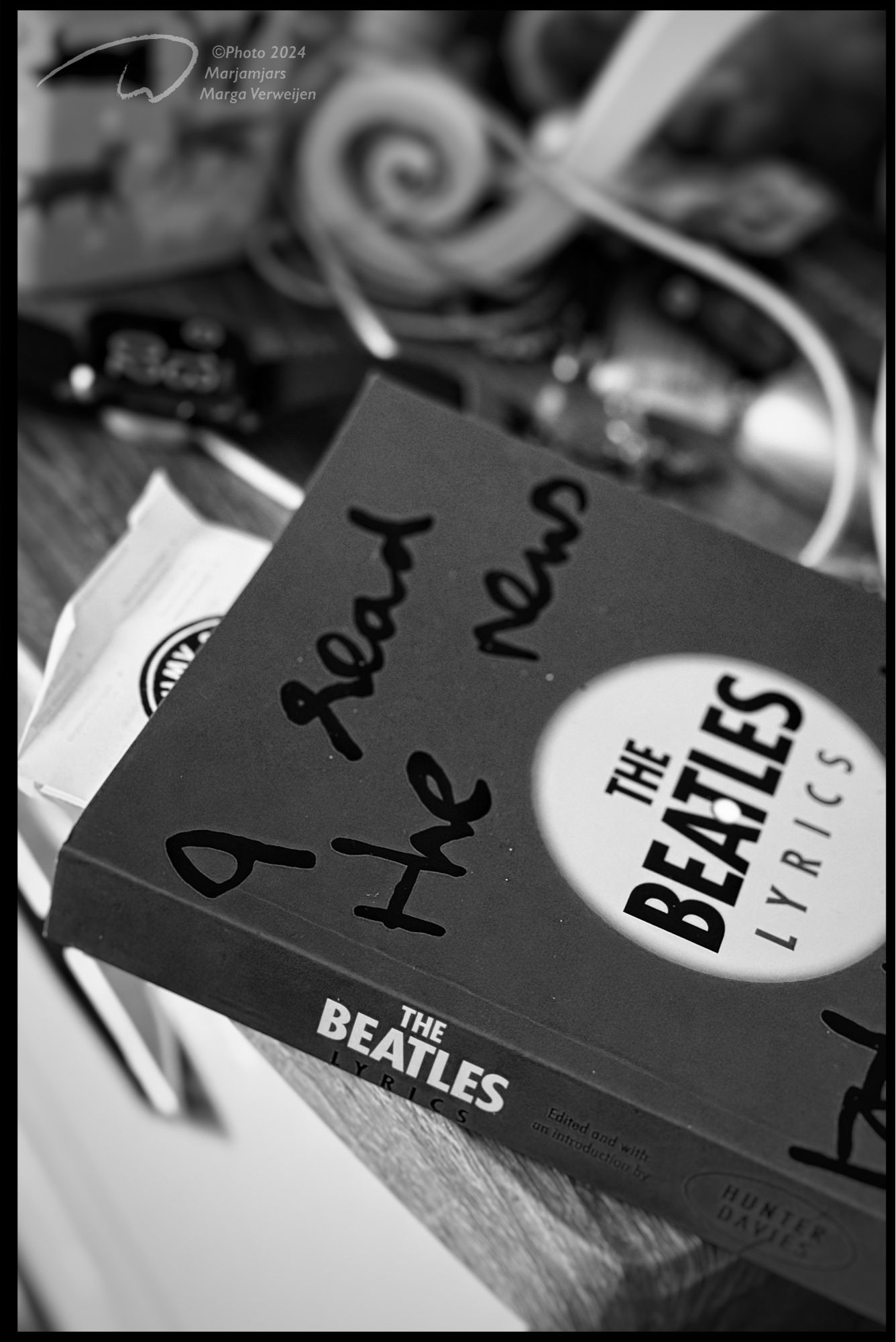 I read the news today oh boy. The Beatles lyrics book I bought yesterday on my nightstand.