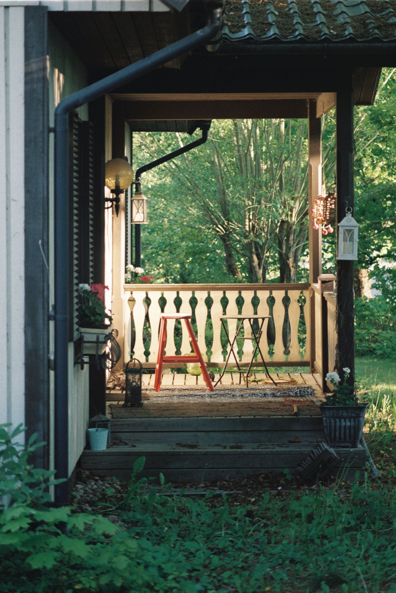 A porch with two benches