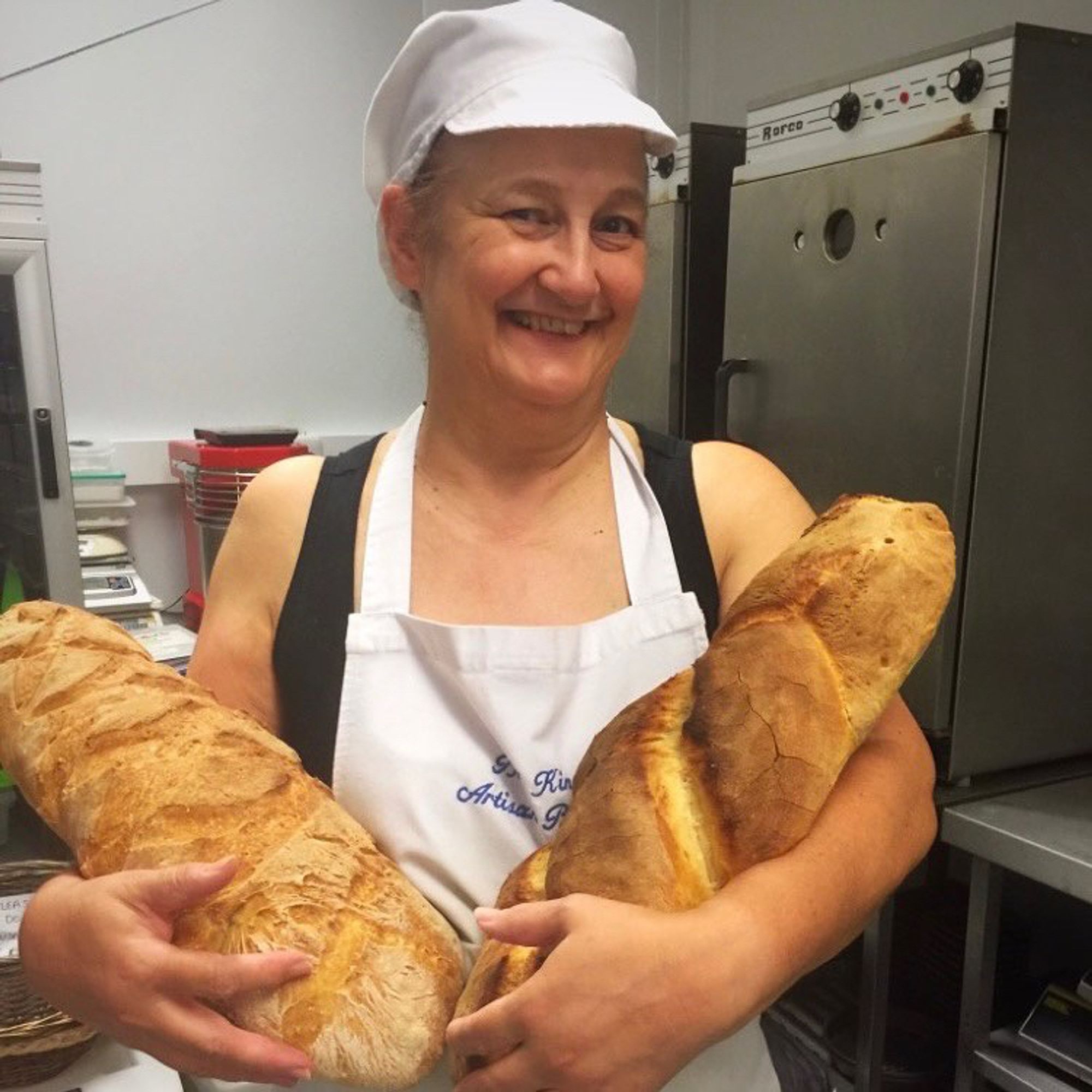 Bakery Elf with 2 large loaves