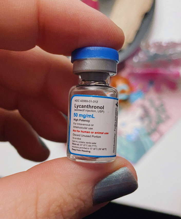 An ampule of Lycanthronol (werewolf injection, USP). 50mg/mL High Potency. If you point out that the label does say "Each mL contains: sterile water" I will block you for being Like That