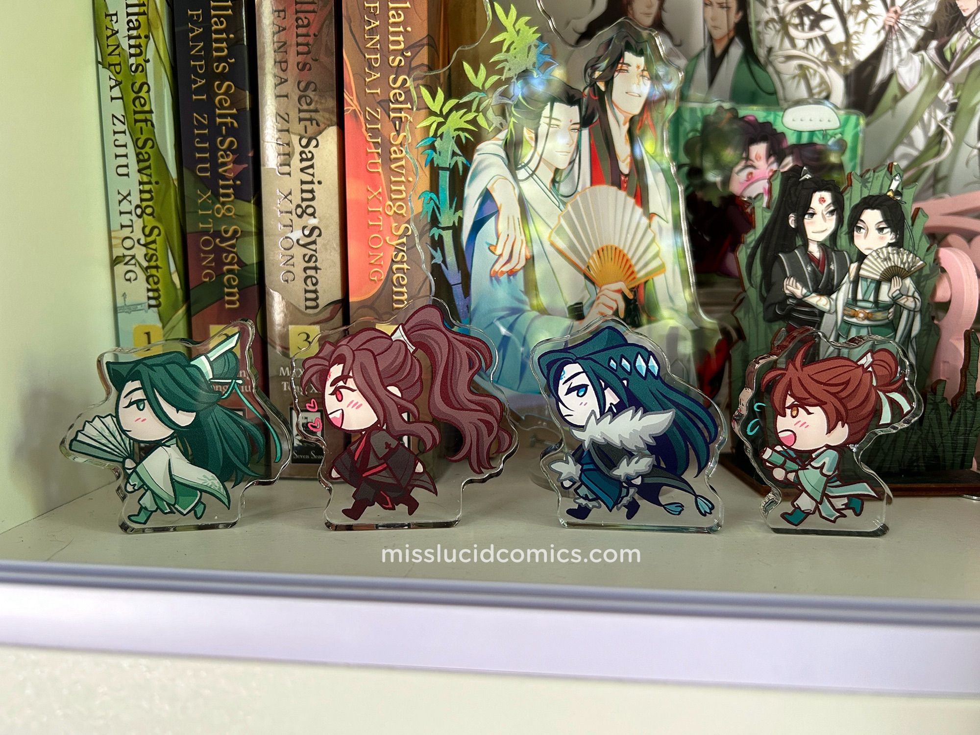 Bingqiu and moshang acrylic blocks in front of SVSSS English books