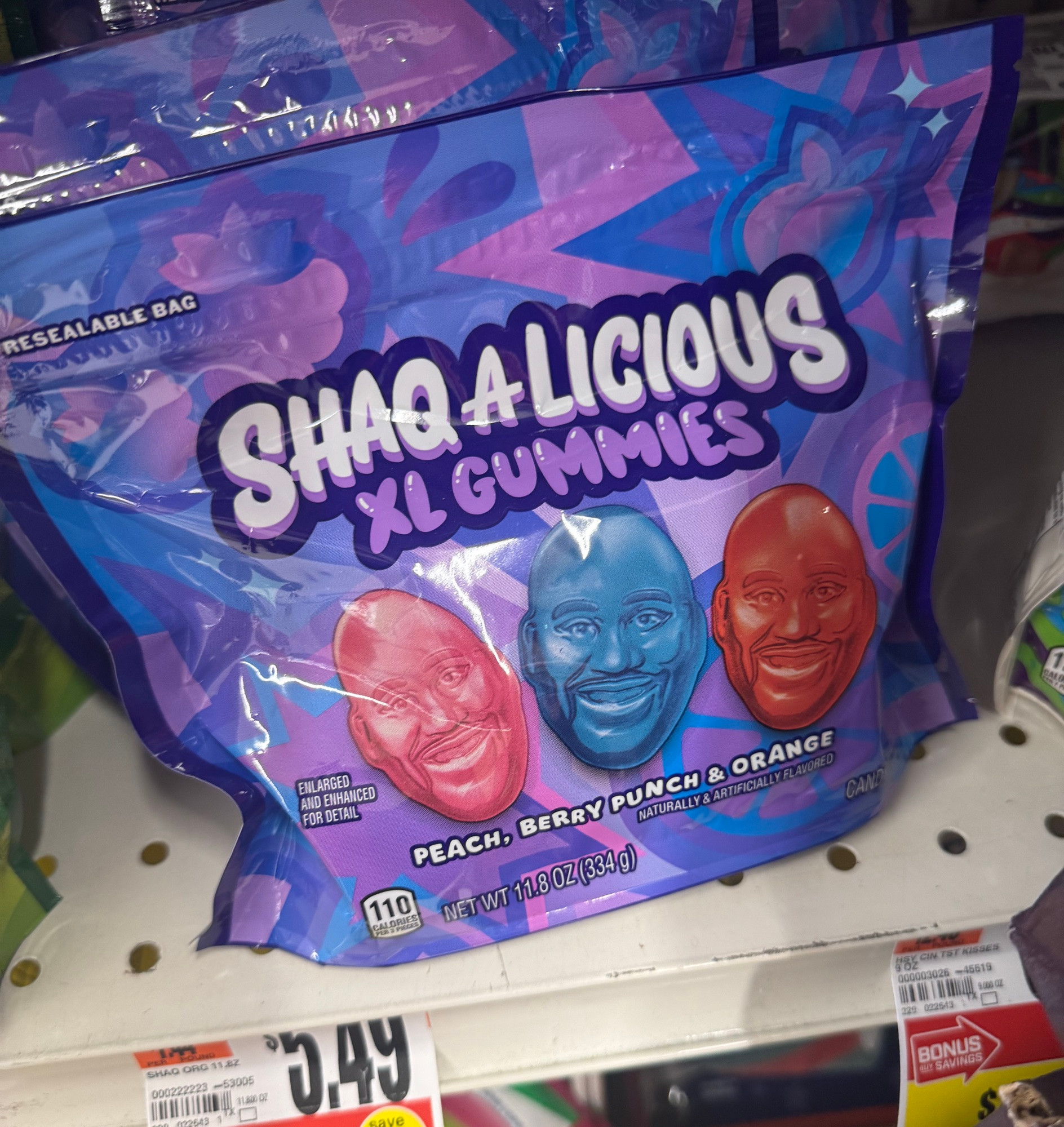 
RESEALABLE BAG
SHAQ ALIGIOUS
E CUMMIES
ENLARGED AND ENHANCED FOR DETAIL
PEACH. BERRY PUNCH & ORANGE
MATURALLYS ARTIFICIALLY FLAVORED
119 MET 14802(830e)
CAND