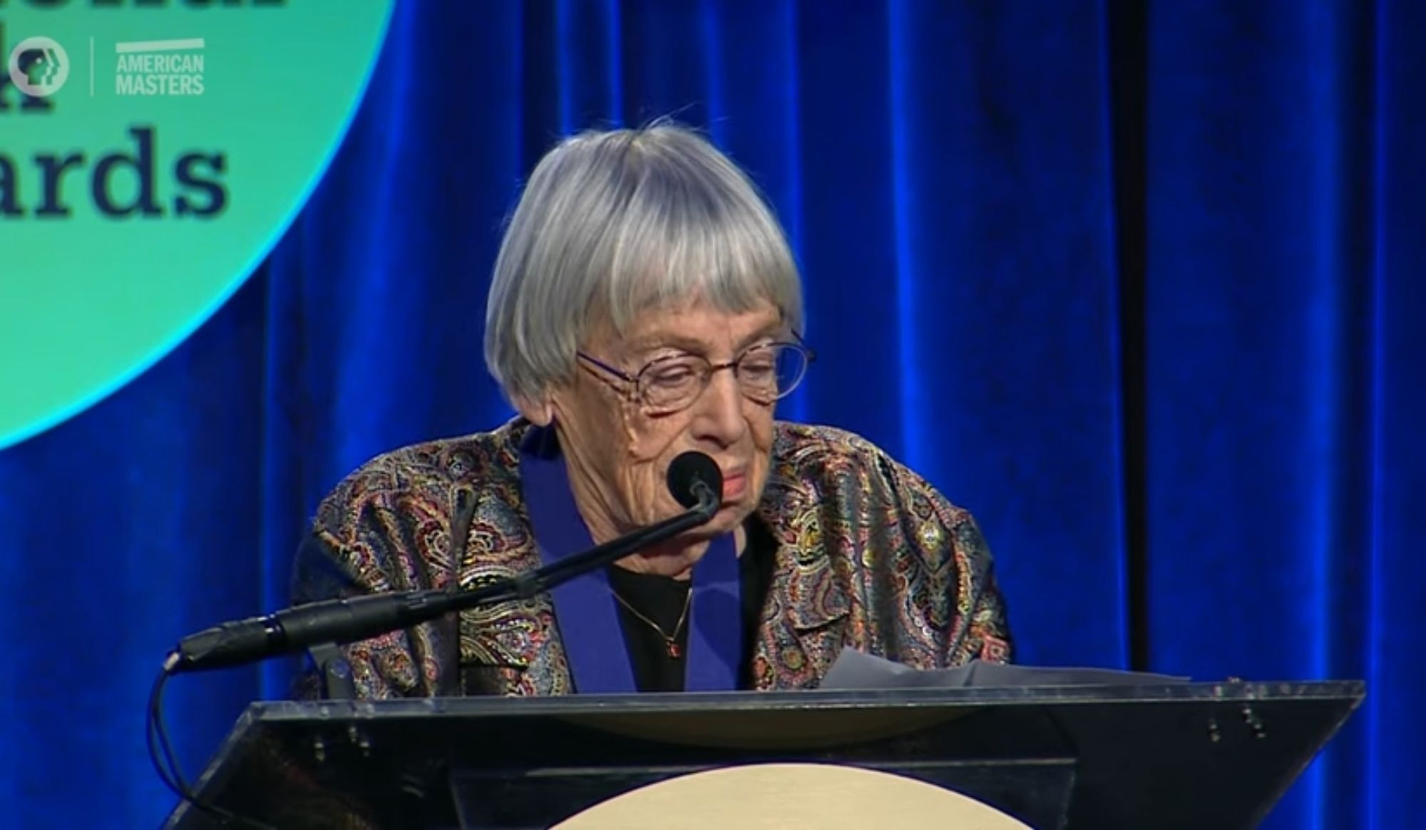 A picture of Ursula Le Guin speaking on 2014 National Book Awards Ceremony