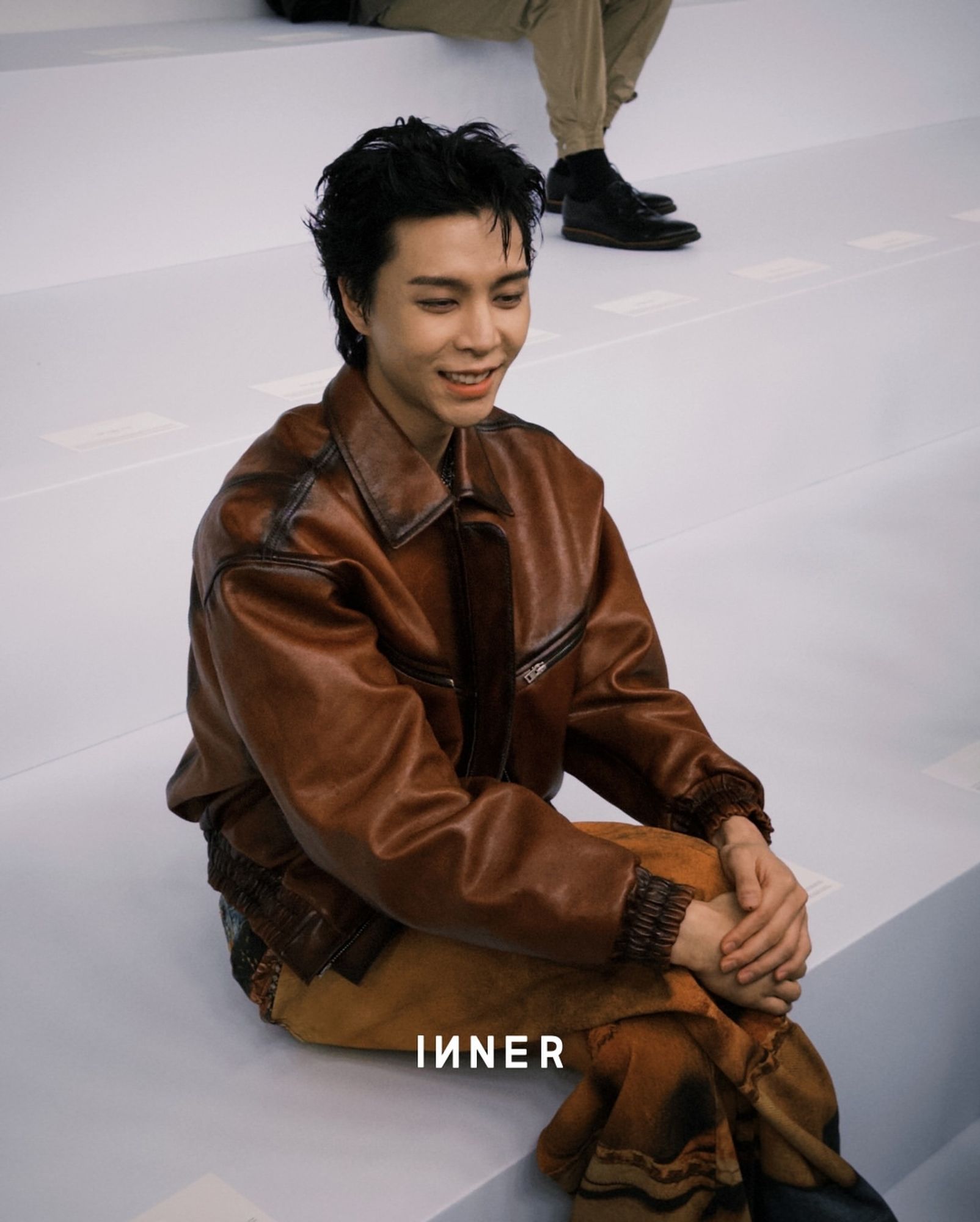 really hot photo of johnny for acne studios and he's sitting in his seat waiting for the show to start