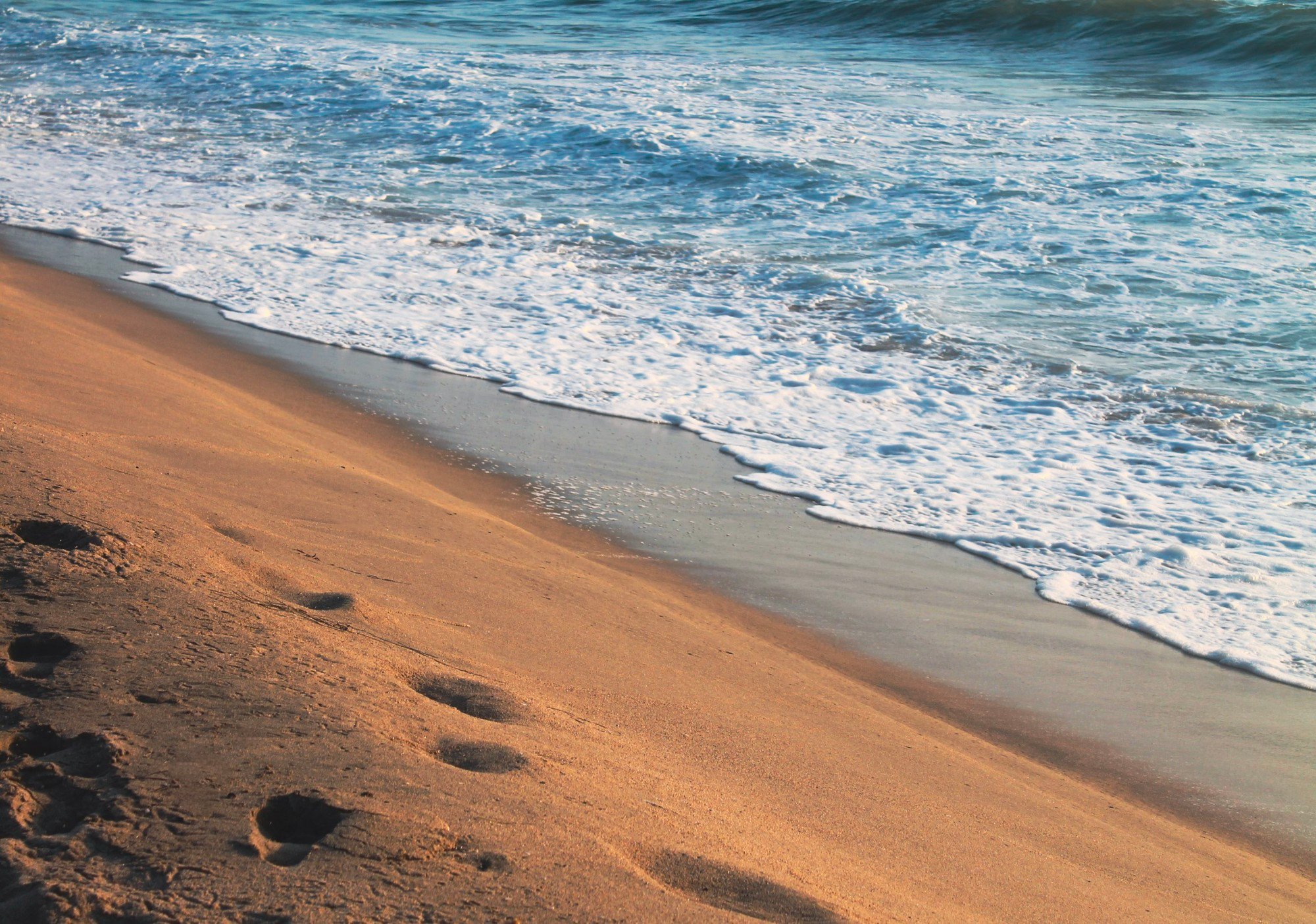 Ocean waves and sand