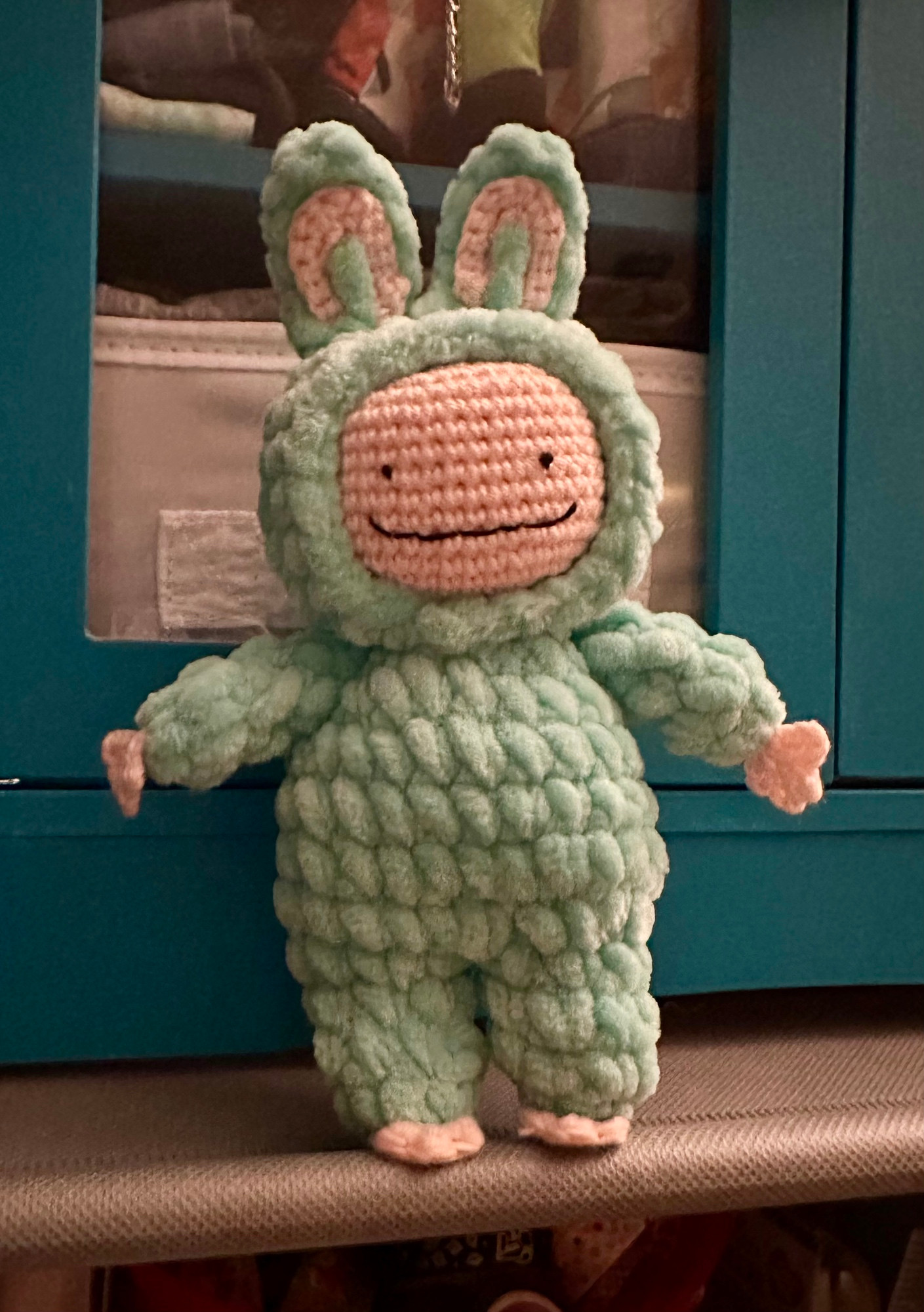 A crocheted bunny monster