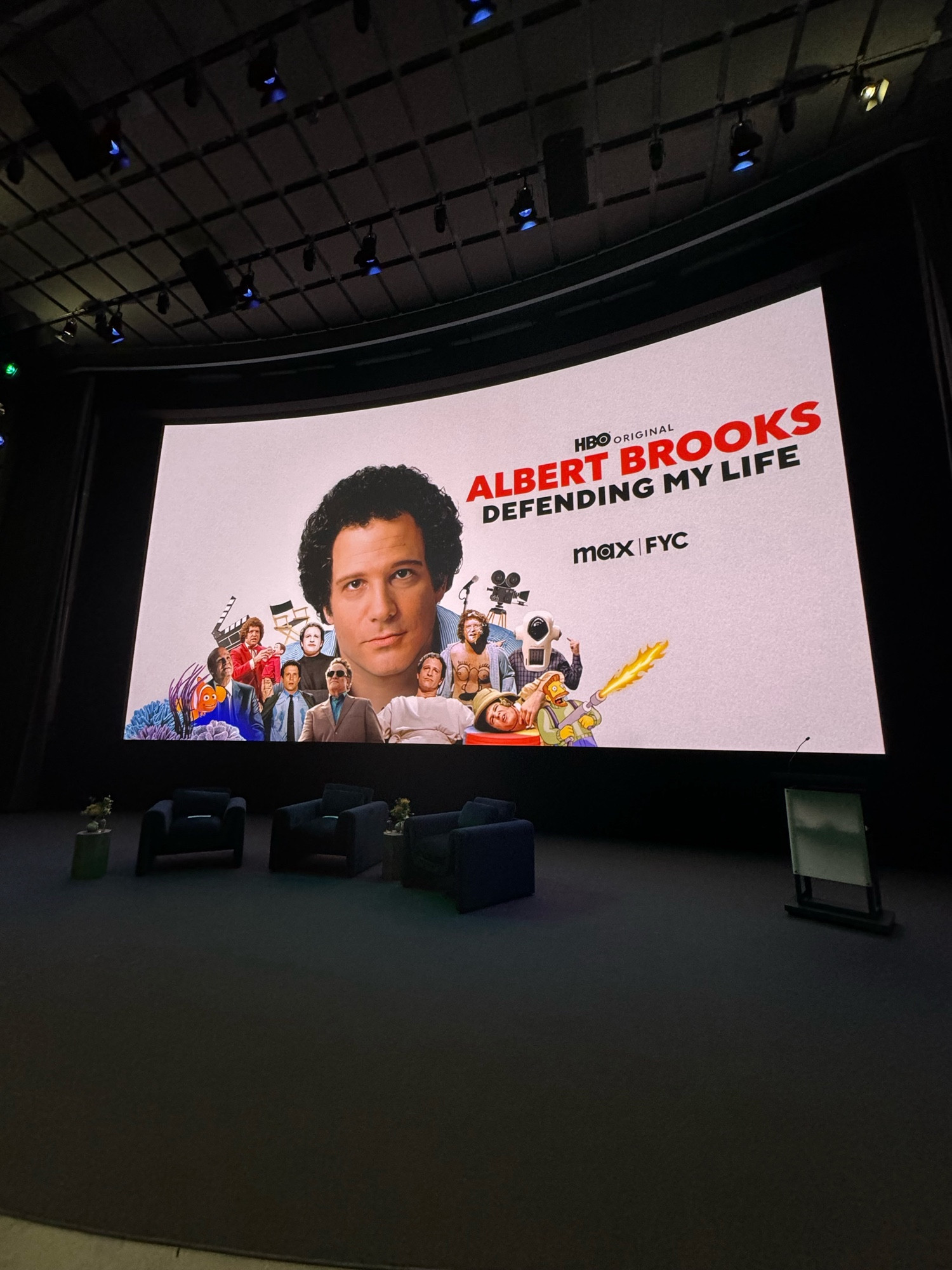 Movie Screen with promotional slide for Albert Brooks Defending Your Life