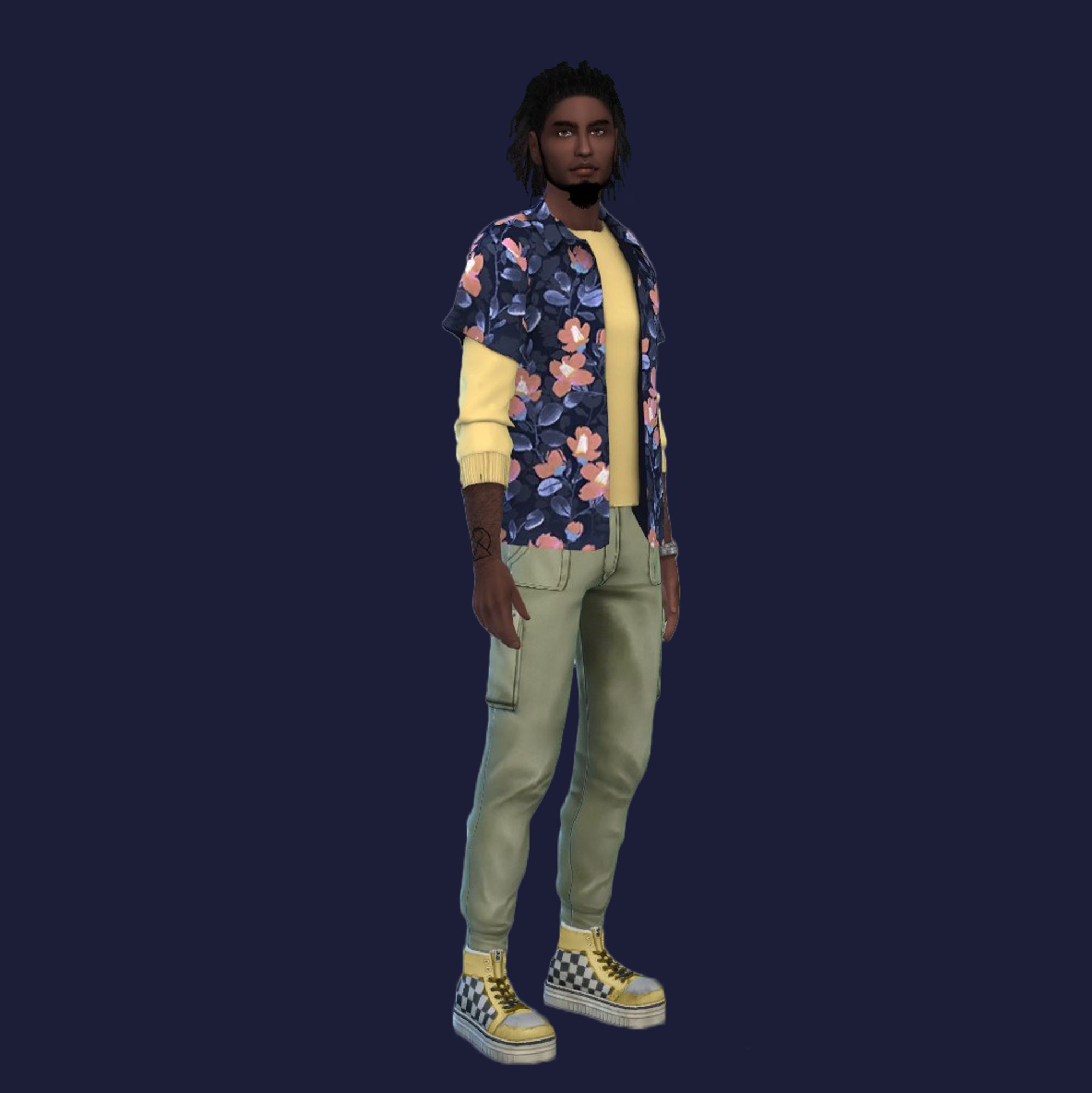 A Sim named Deon Steele with green pants, a yellow shirt with a floral blue over-shirt and matching yellow shoes.