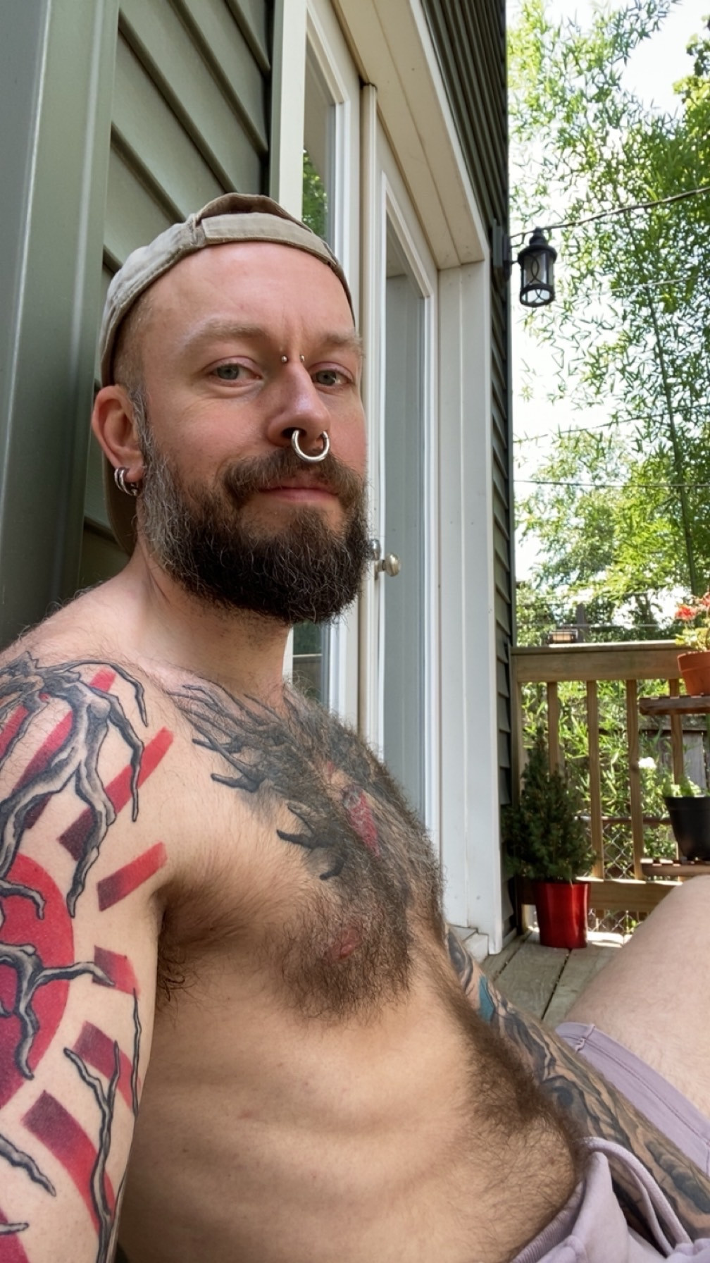 Sitting on my deck, shirtless and stoned. 