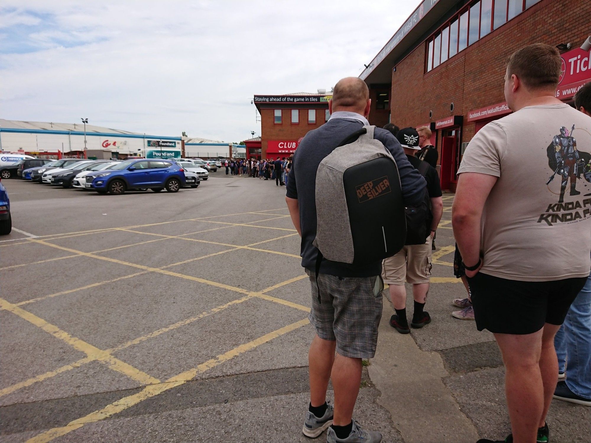 People in line waiting at the stadium to be let in at sotfest 2023