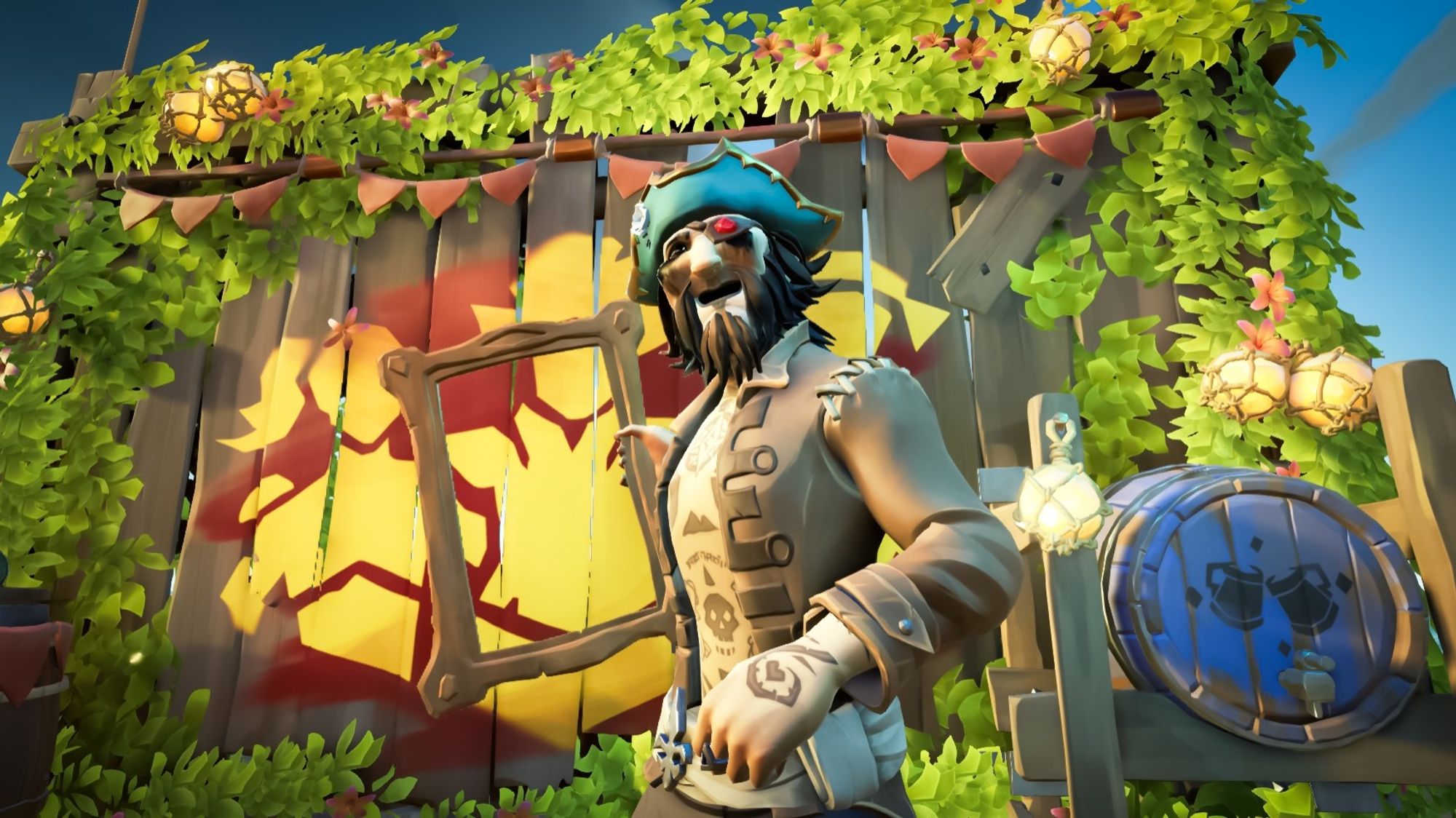 My pirate standing by the community photo wall, holding up a frame