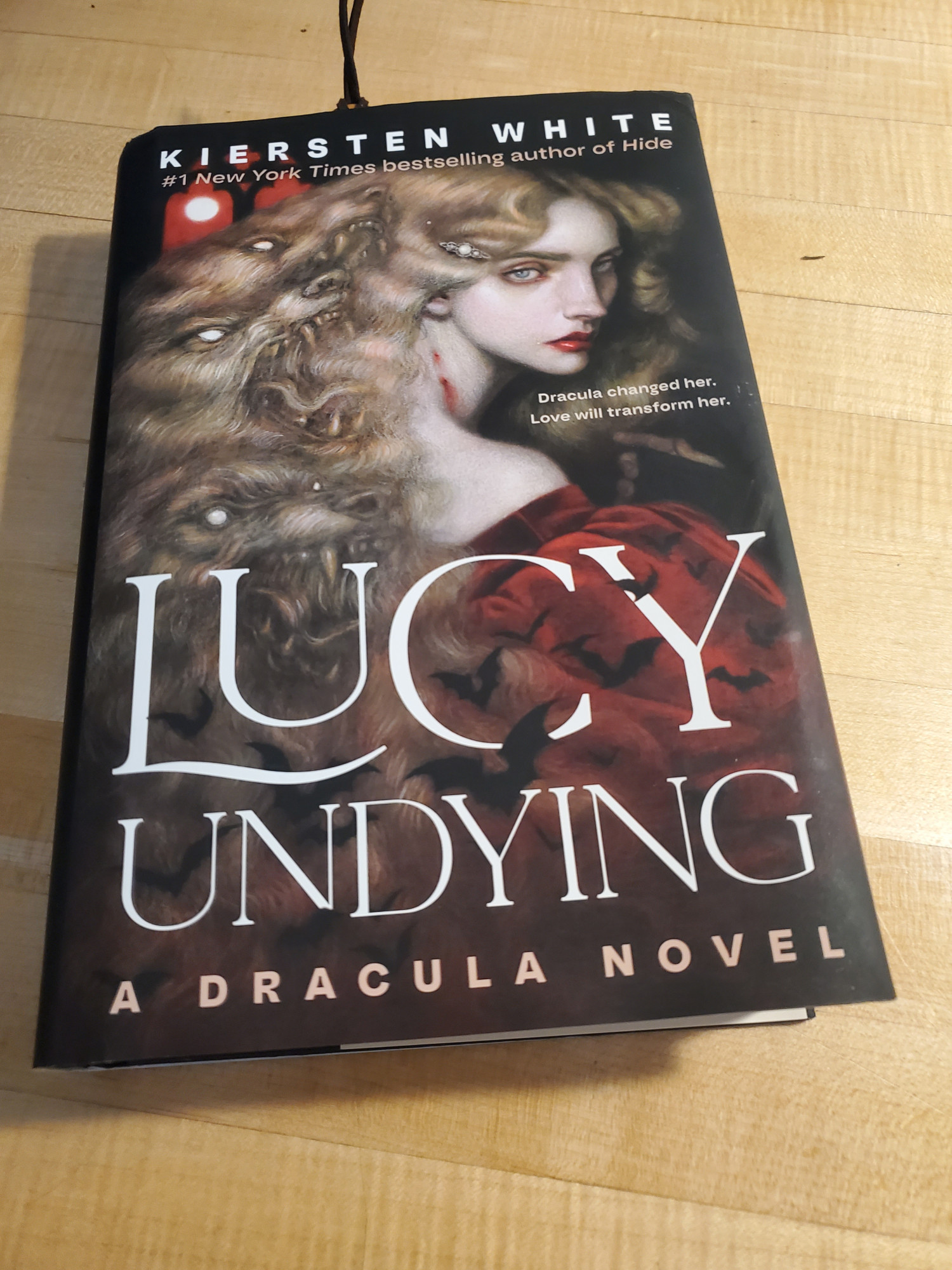 A hardcover copy of Lucy Undying.