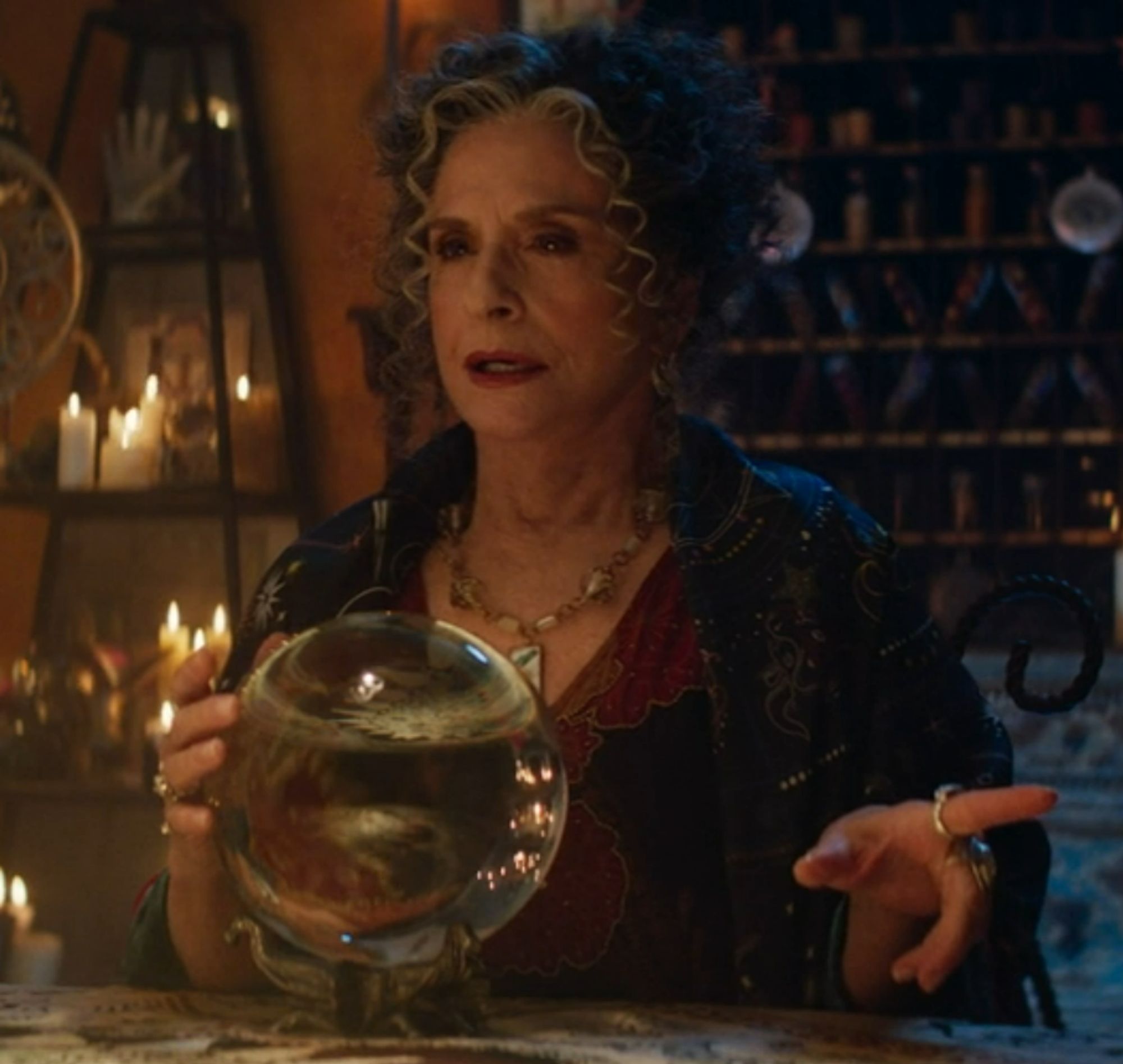 A shot of a witchy clairvoyant woman from Agatha all along.