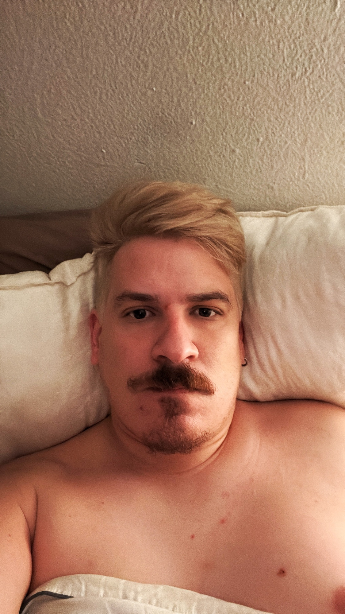 Man laying in bed