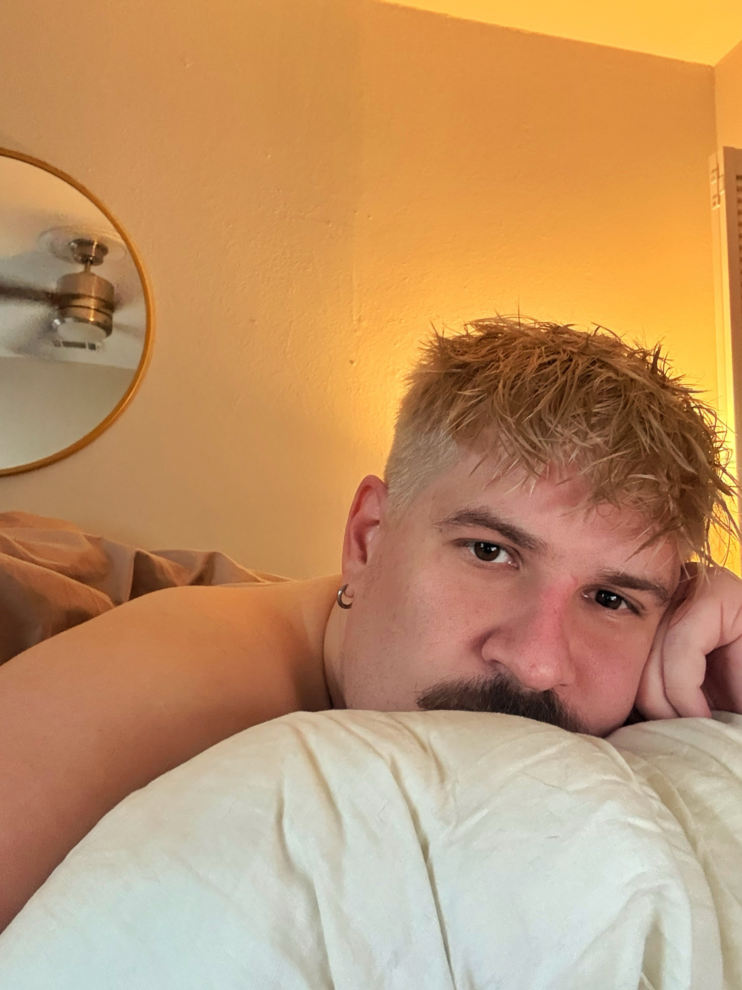 Man laying in bed 