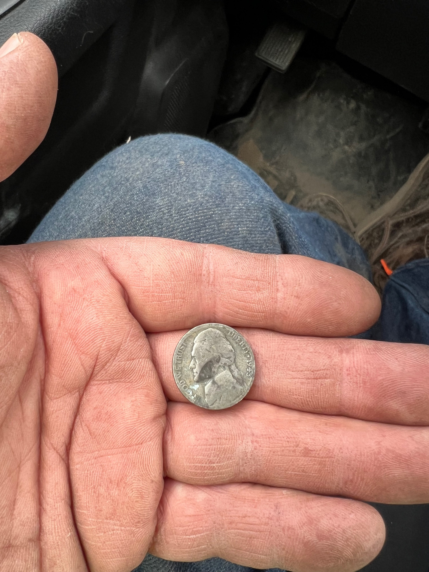 A well worn nickel from 1943