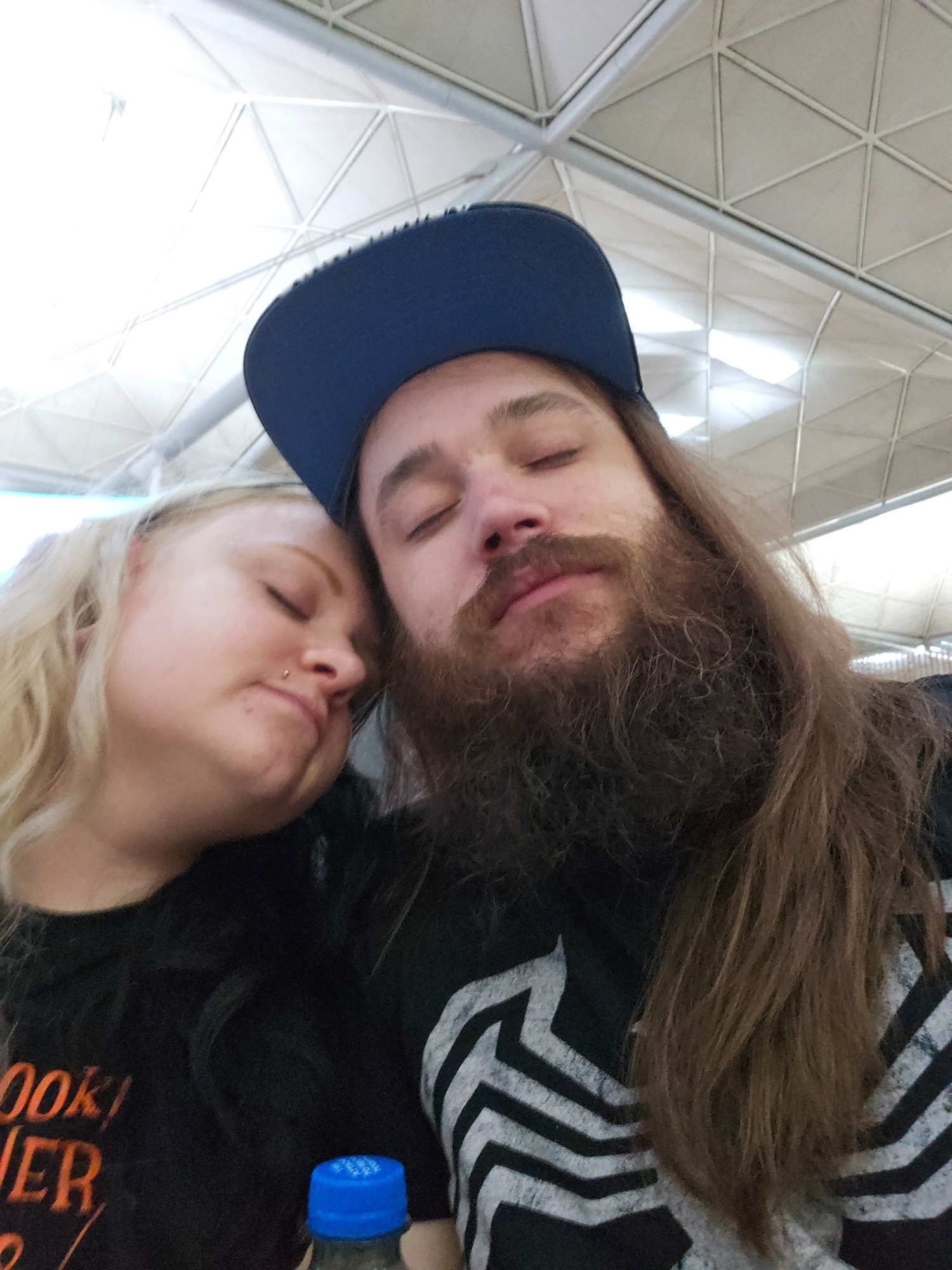 Two sleepy emos at Stansted. 