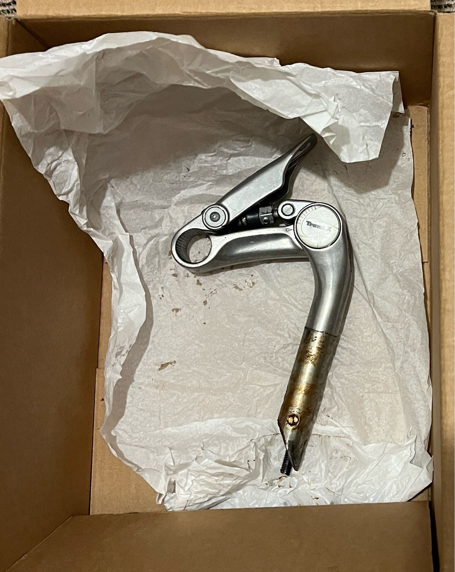 Gazelle adjustable stem packed into a box, side-on showing the pivot mechanism and the quill.