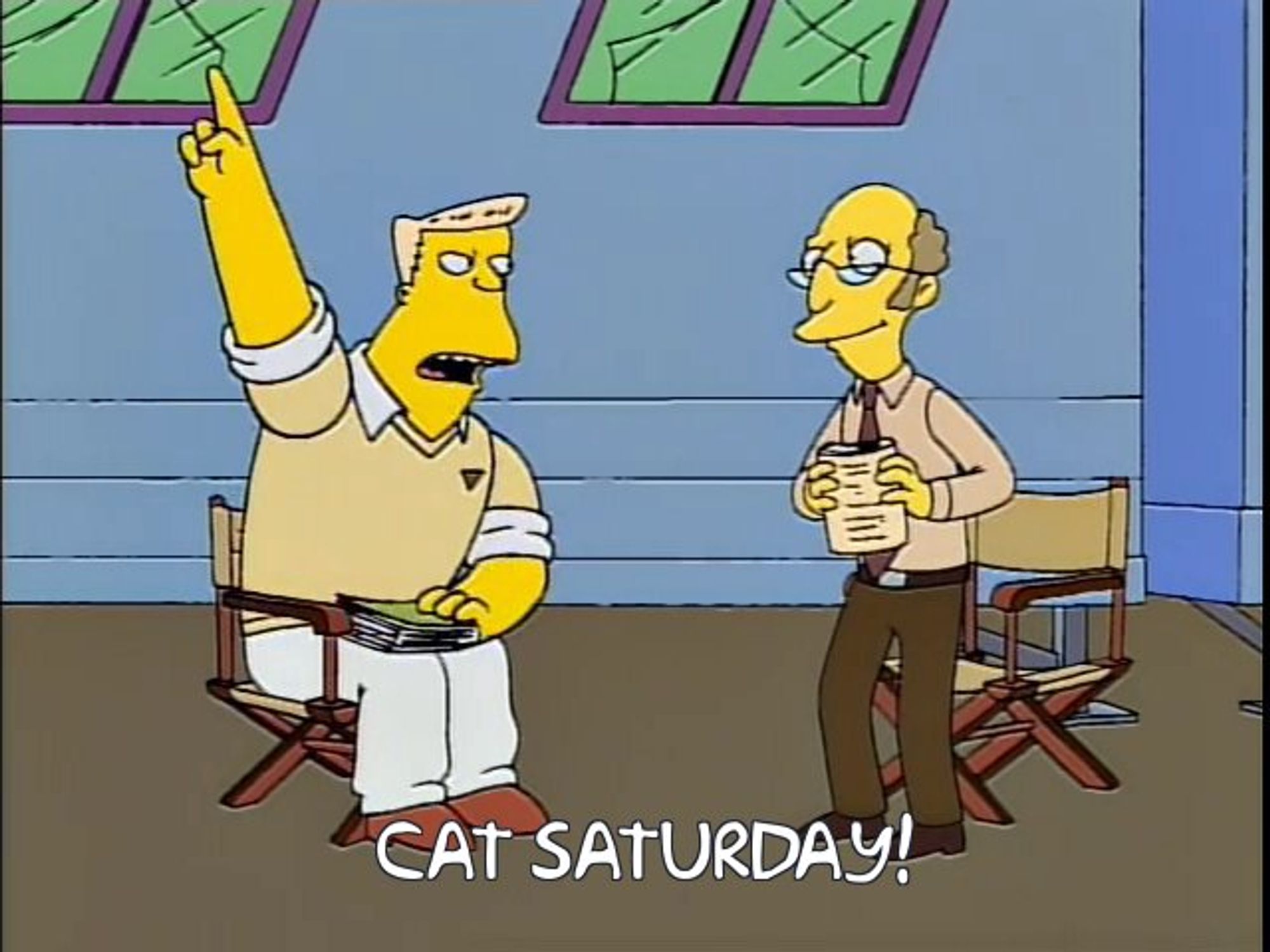 frinkiac.com: the "up at at them!" scene, but the caption says "cat saturday!"