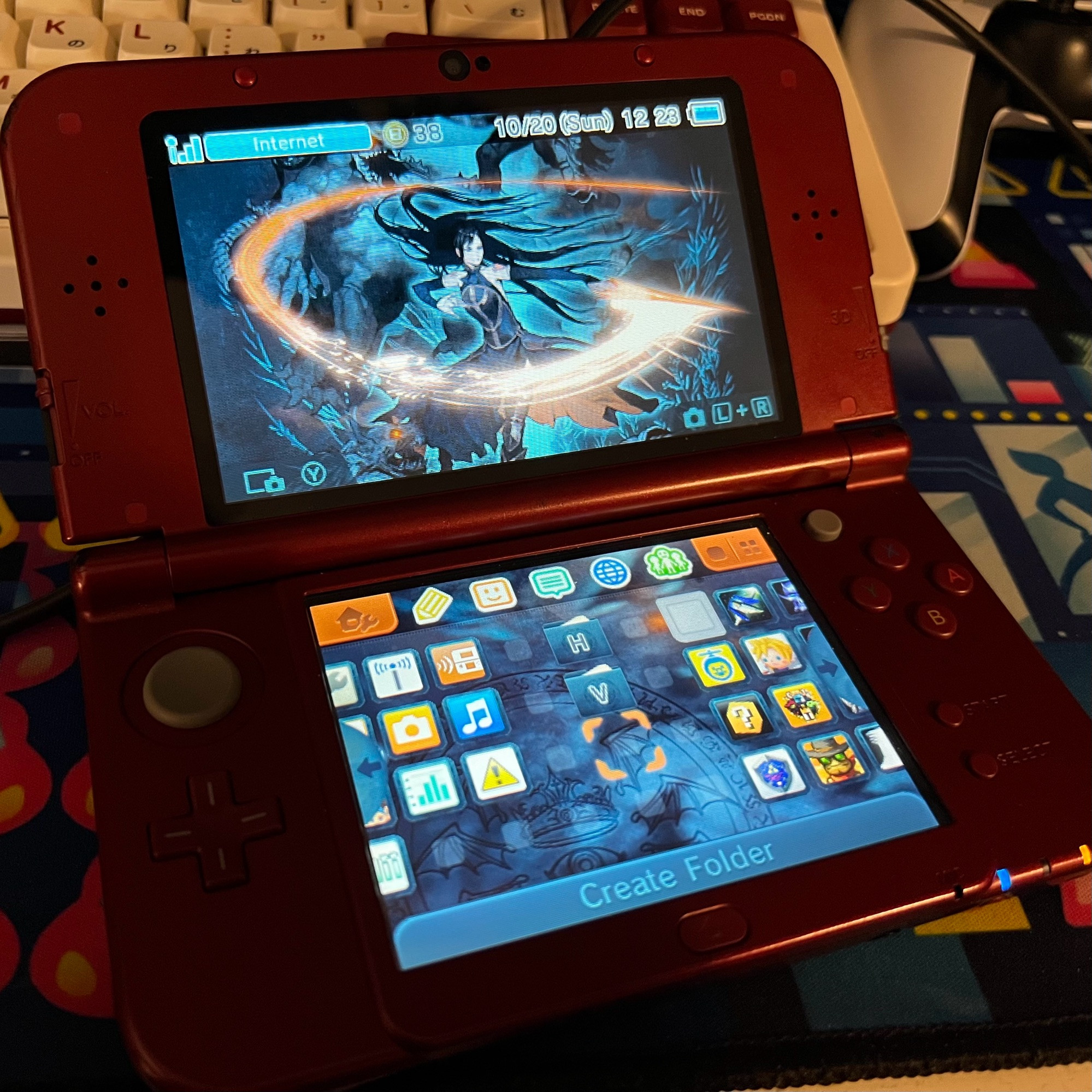 A red Nintendo 3DS with a custom theme featuring Shanoa, the main character of Castlevania: Order of Ecclesia