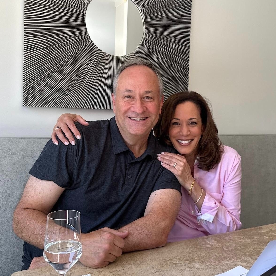 A photograph of Vice President Harris and Douglas Emhoff at their home.