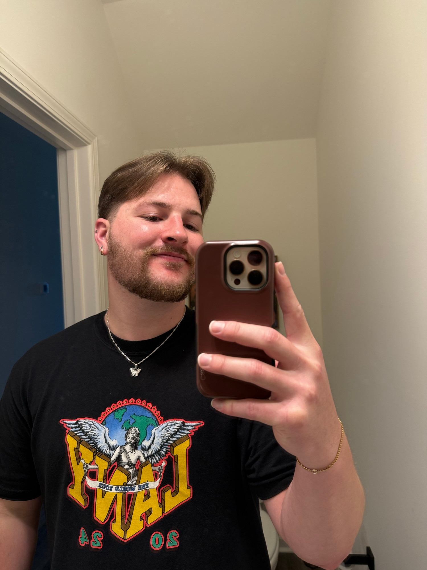 Mirror selfie showing off my new haircut 