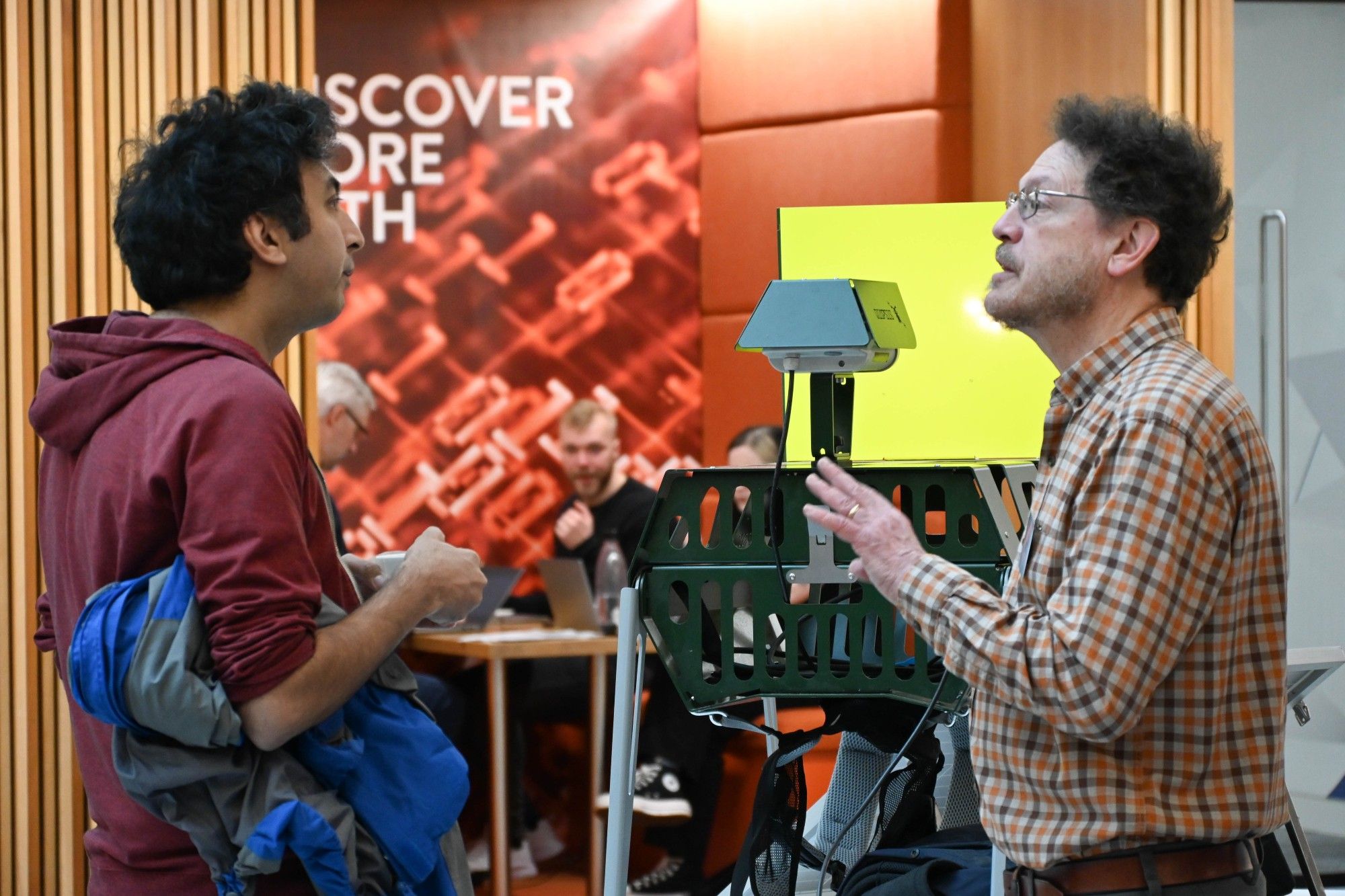 Professor Bill Kunin in conversation with a launch attendee