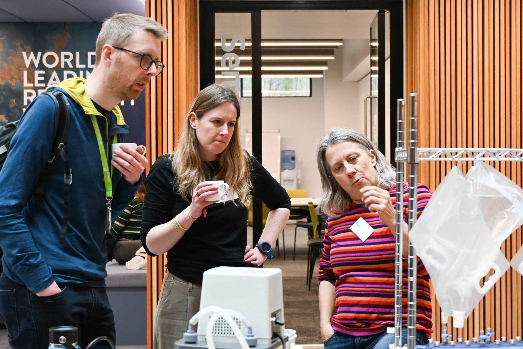 Dr Maria Beger shares her water filtering equipment with launch attendees