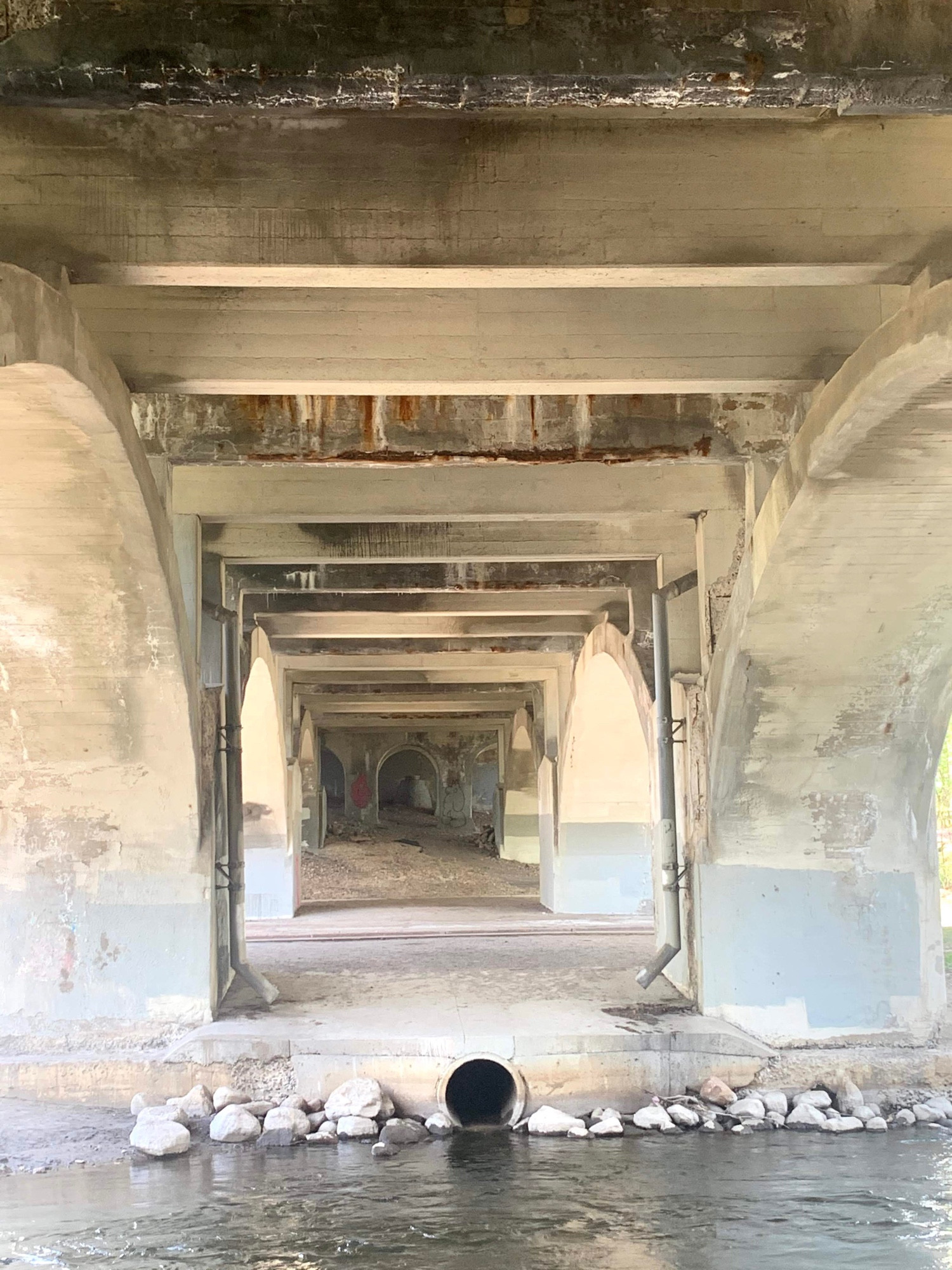 Underside of perpendicular bridges, showing a series of spans 