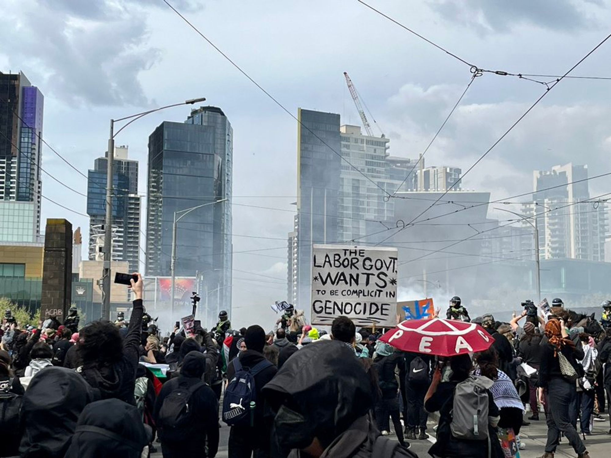 Protesters at the 'Land Forces' arms expo in Melbourne/Naarm.