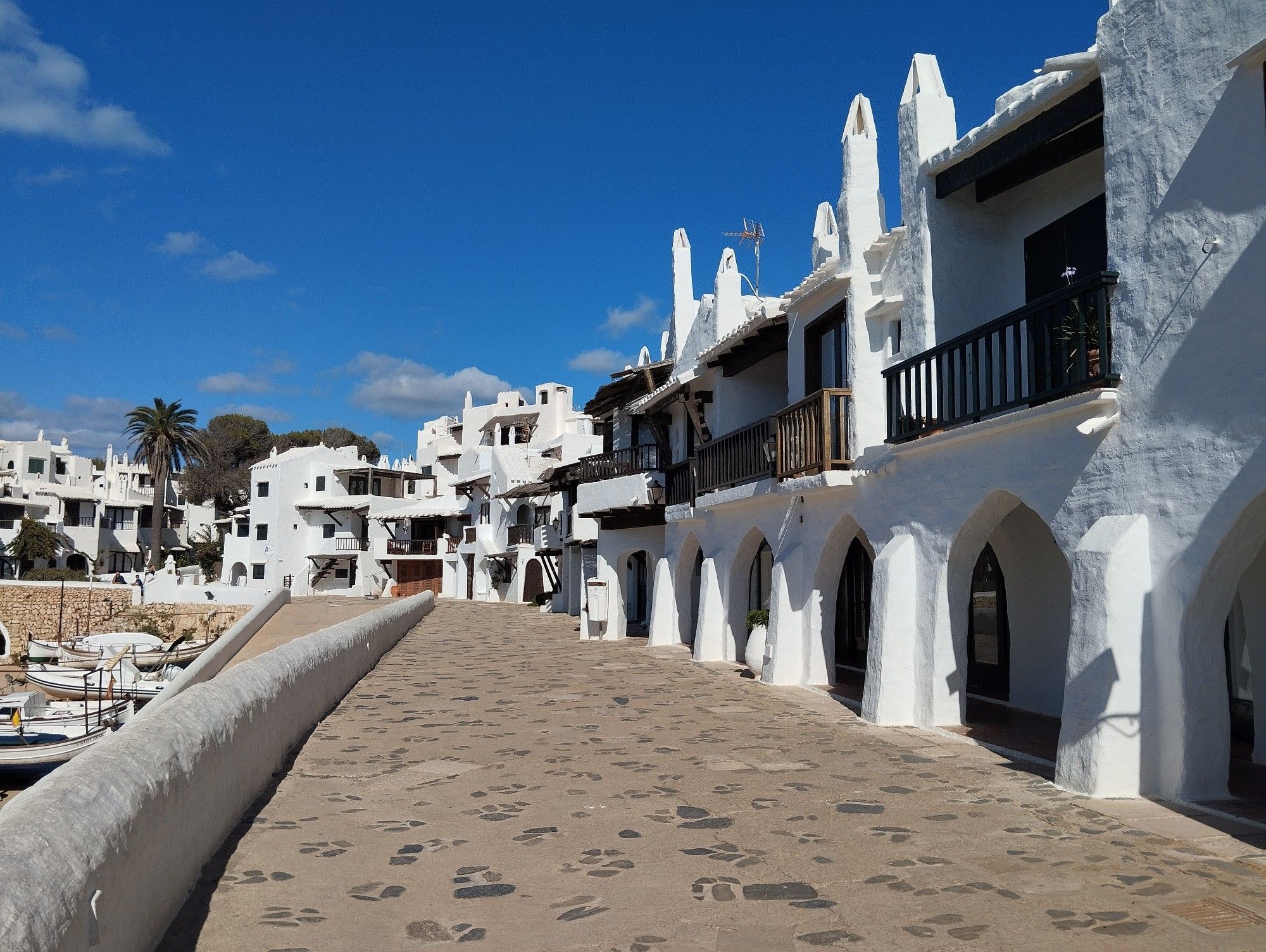 A street of white houses in Binibecquer