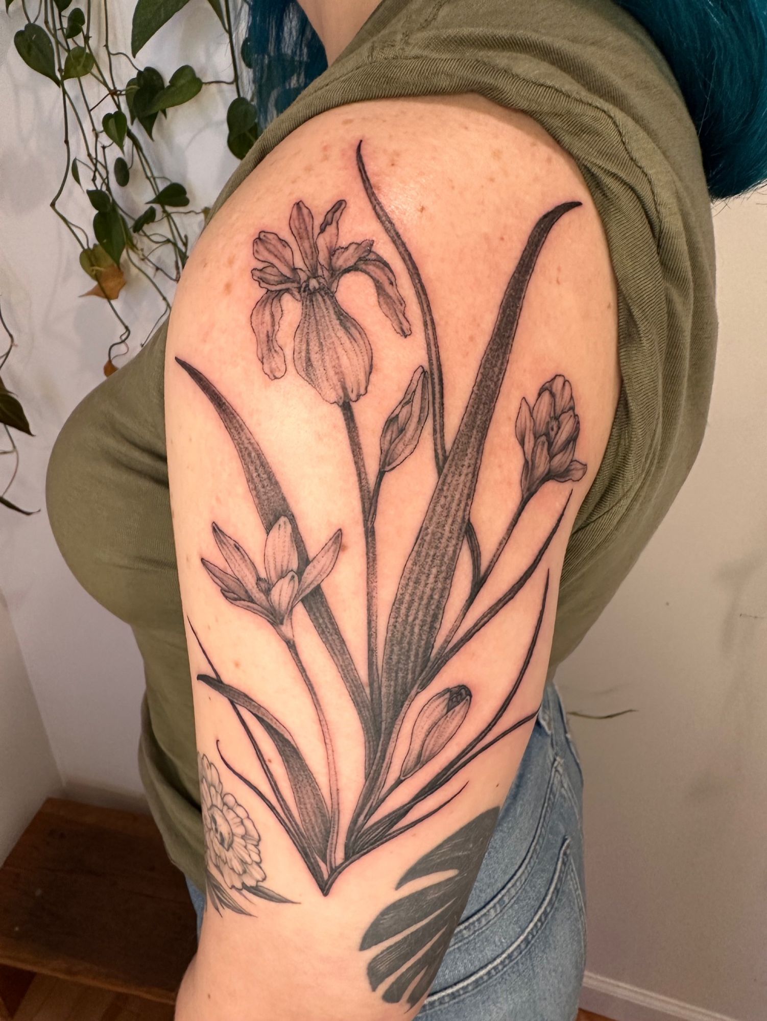 Iris and crocus tattoo design on Jenn’s upper arm