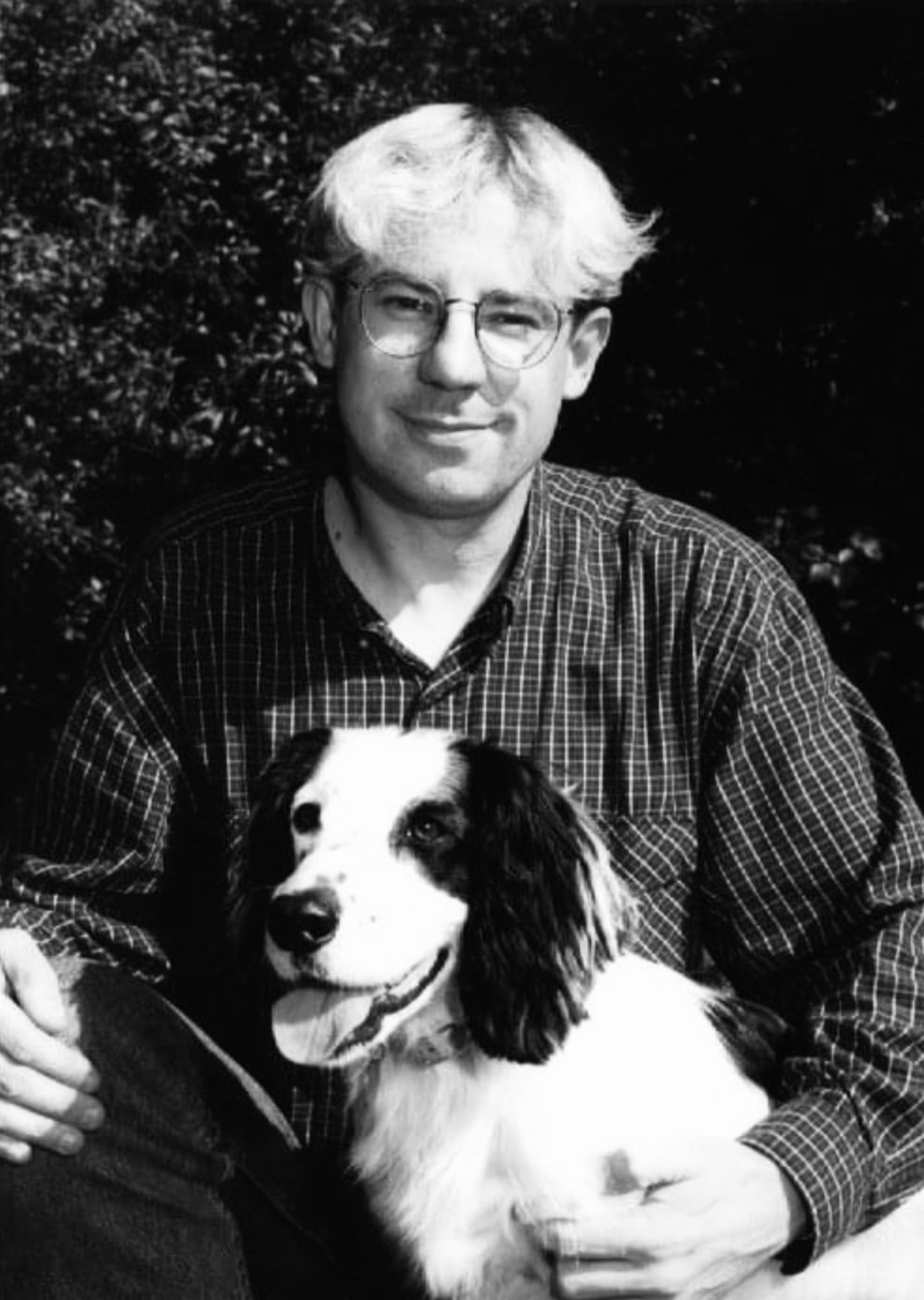 Charlie with his black and white cocker spaniel Mickey