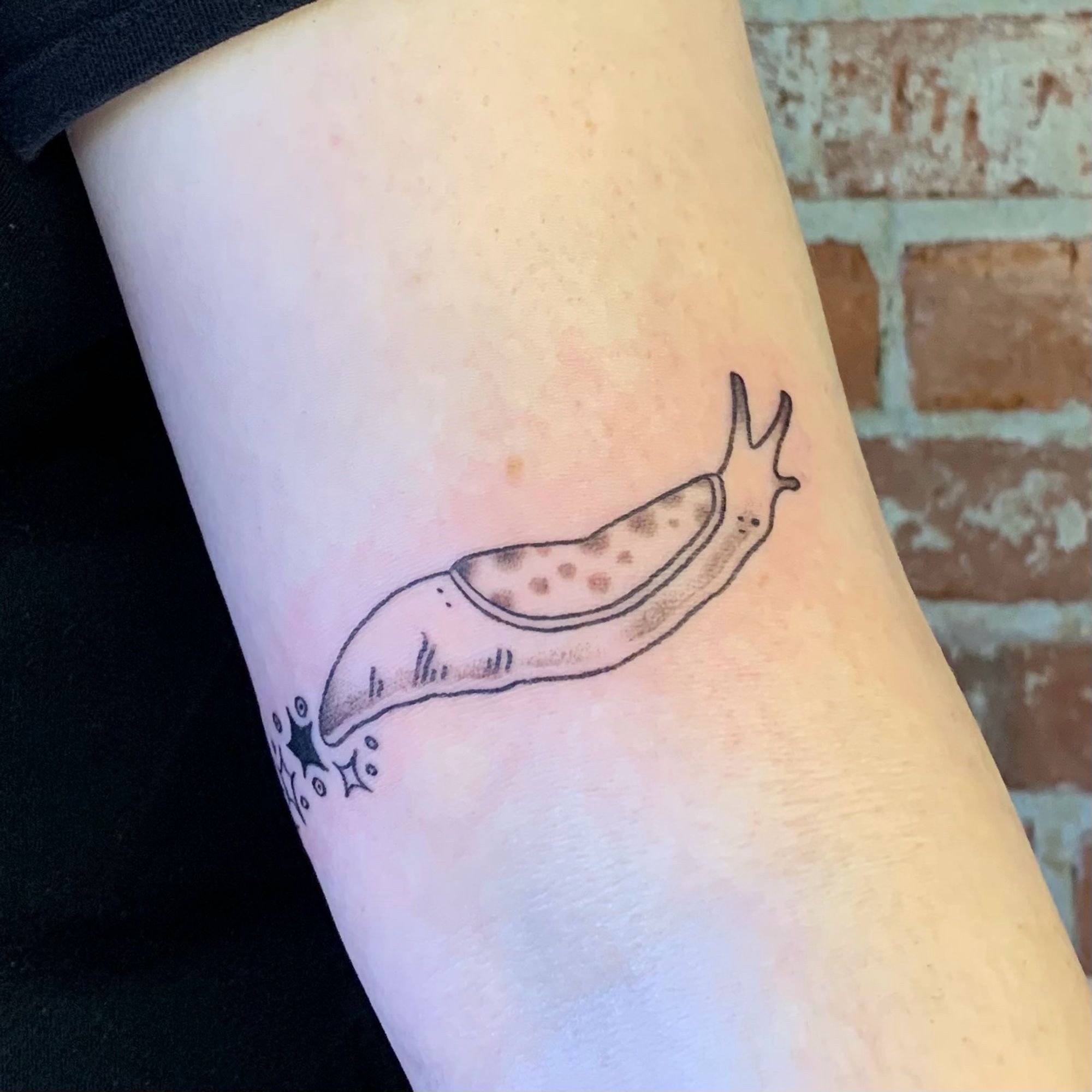 A slug tattooed on Kathryn’s arm!