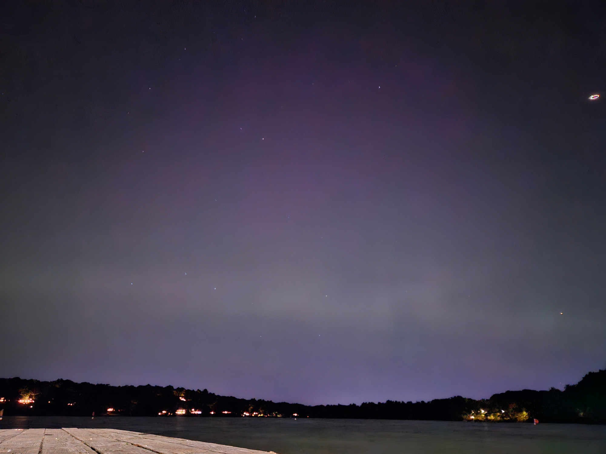 A band of green is faintly discernible across the horizon