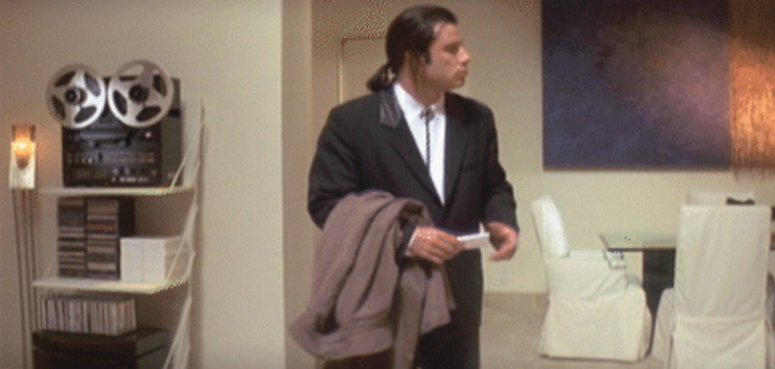 Vincent Vega looking to the right confused.