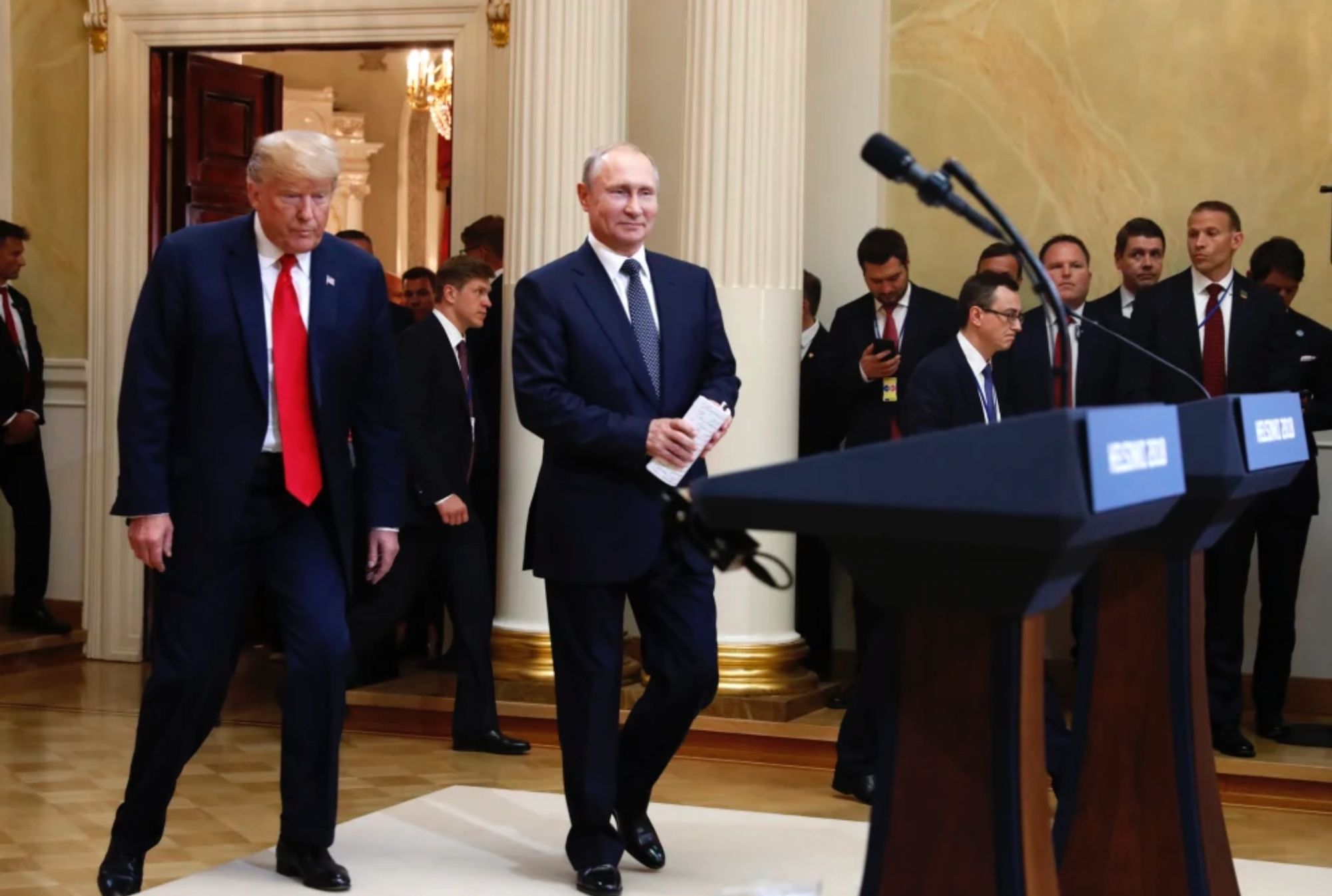 Photo from the first meeting in Helsinki of Trump and Putin Trump looks like he’s not happy. Putin looks like he’s overjoyed.