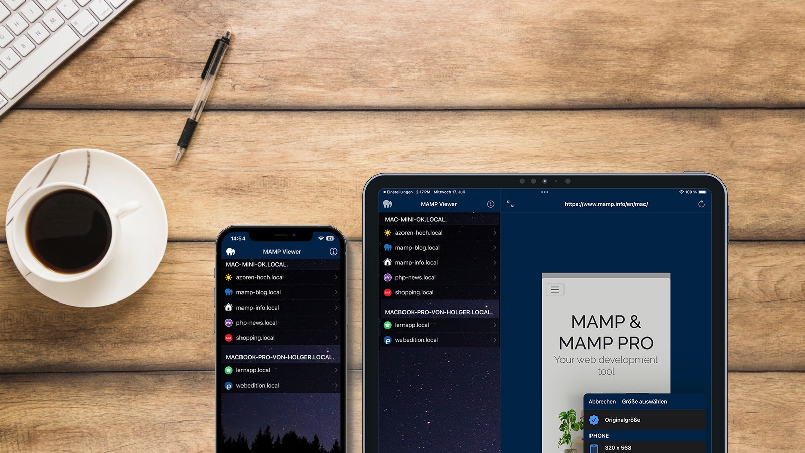 Iphone and ipad with MAMP Viewer opened on a wooden table with a keyboard and a cup of coffee