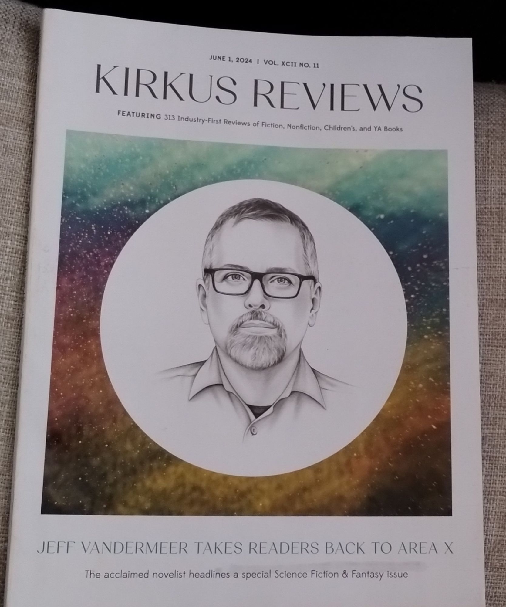 Photo of the cover of June 1st, 2024, issue of Kirkus featuring an illustrated image of Jeff VanderMeer as a part of advertising the upcoming release of a new Area X book entitled Absolution.