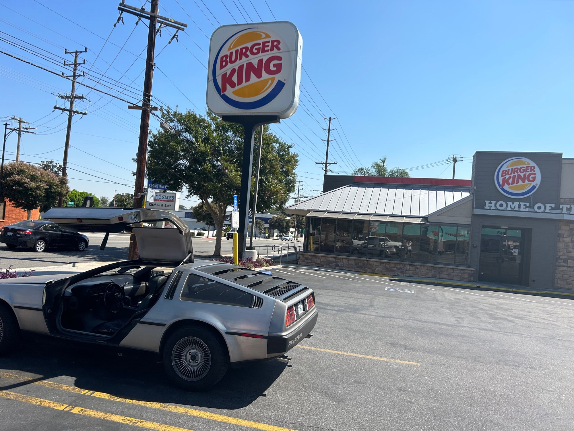 My Delorean parked in front of Back to the Future filming location