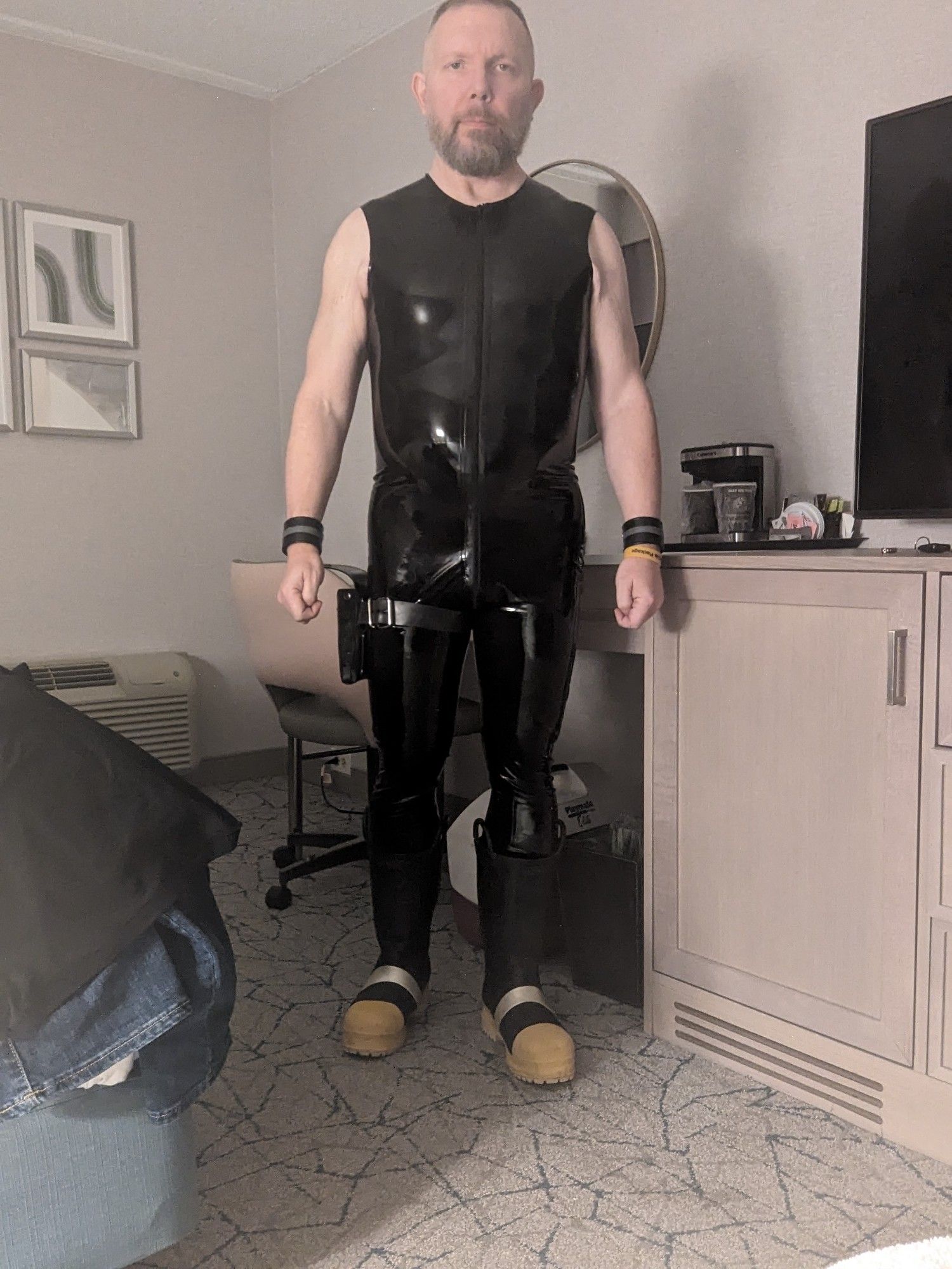 Rubber surfsuit and firefighter boots