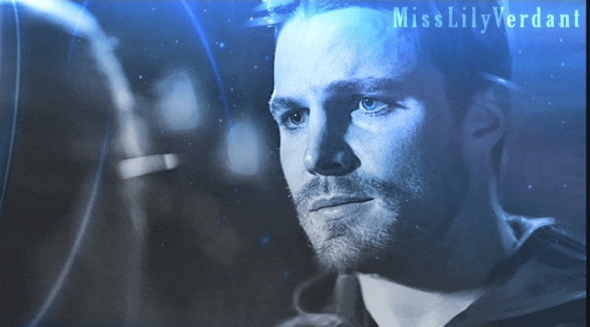 GIF: Still image of Olicity, animated blue light moves slowly across the image. Made in blue hues, in reference of the magnificent blue of his eyes.

The deleted scene of their first kiss, where we see Oliver looking at her when he tells her "I love you."