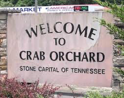 A sign that says 

WELCOME TO CRAB ORCHARD
STONE CAPITAL OF TENNESSEE