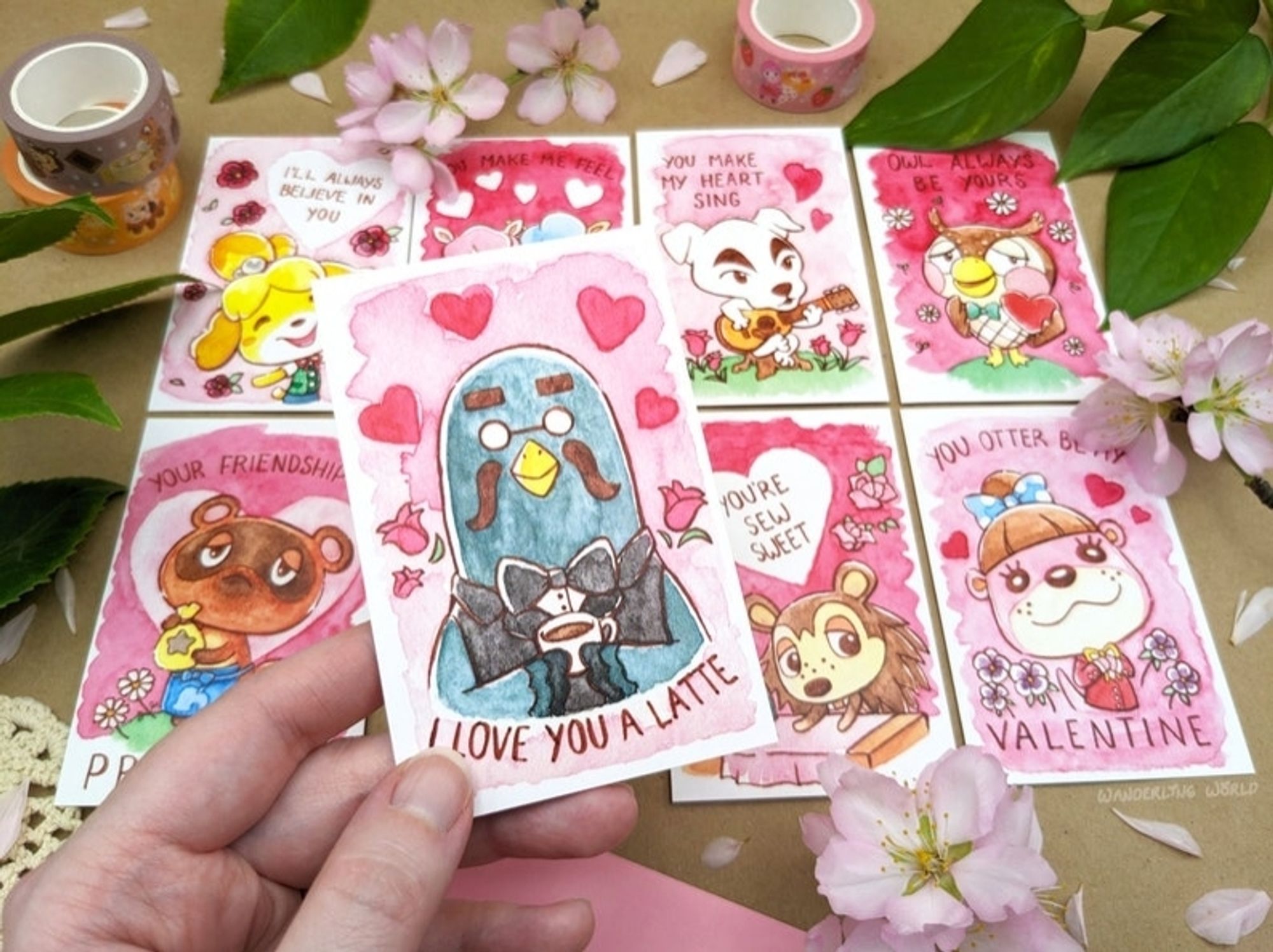 8 watercolor valentine cards featuring Animal Crossing characters. Close up on Brewster holding coffee with the phrase "I love you a latte".