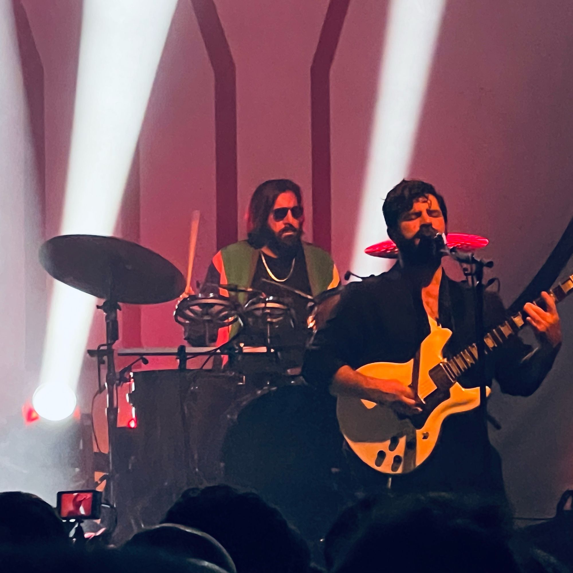 Yannis Phillipakis on guitar and singing, with Vincent Taeger on drums in the background