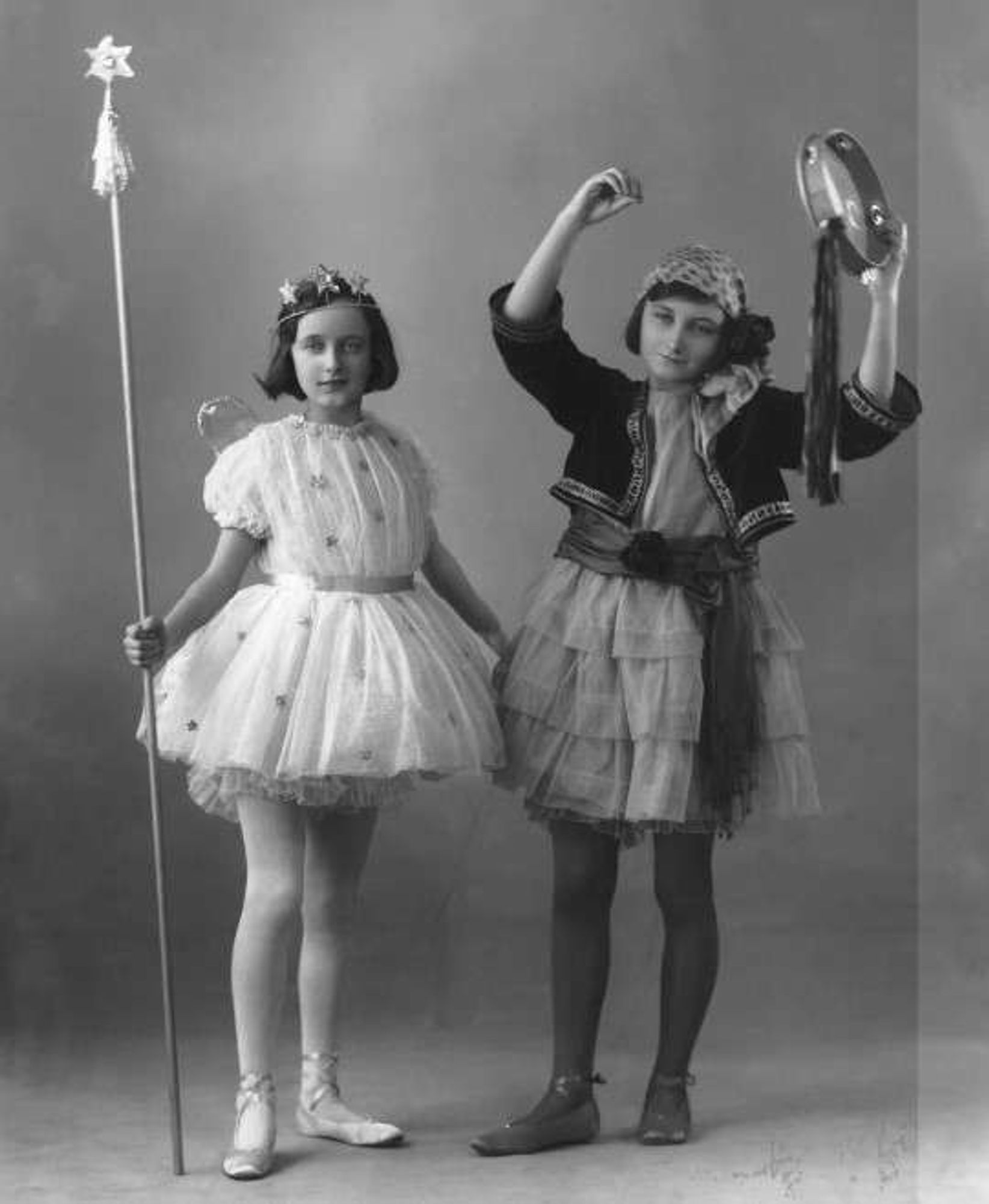 Betty and Joyce Hindley, photo taken 5 January 1925 at  Lord Mayor's Children's Ball, Mansion House, London. Betty dressed as a fairy with a wand, Joyce as a roma musician with a tamborine