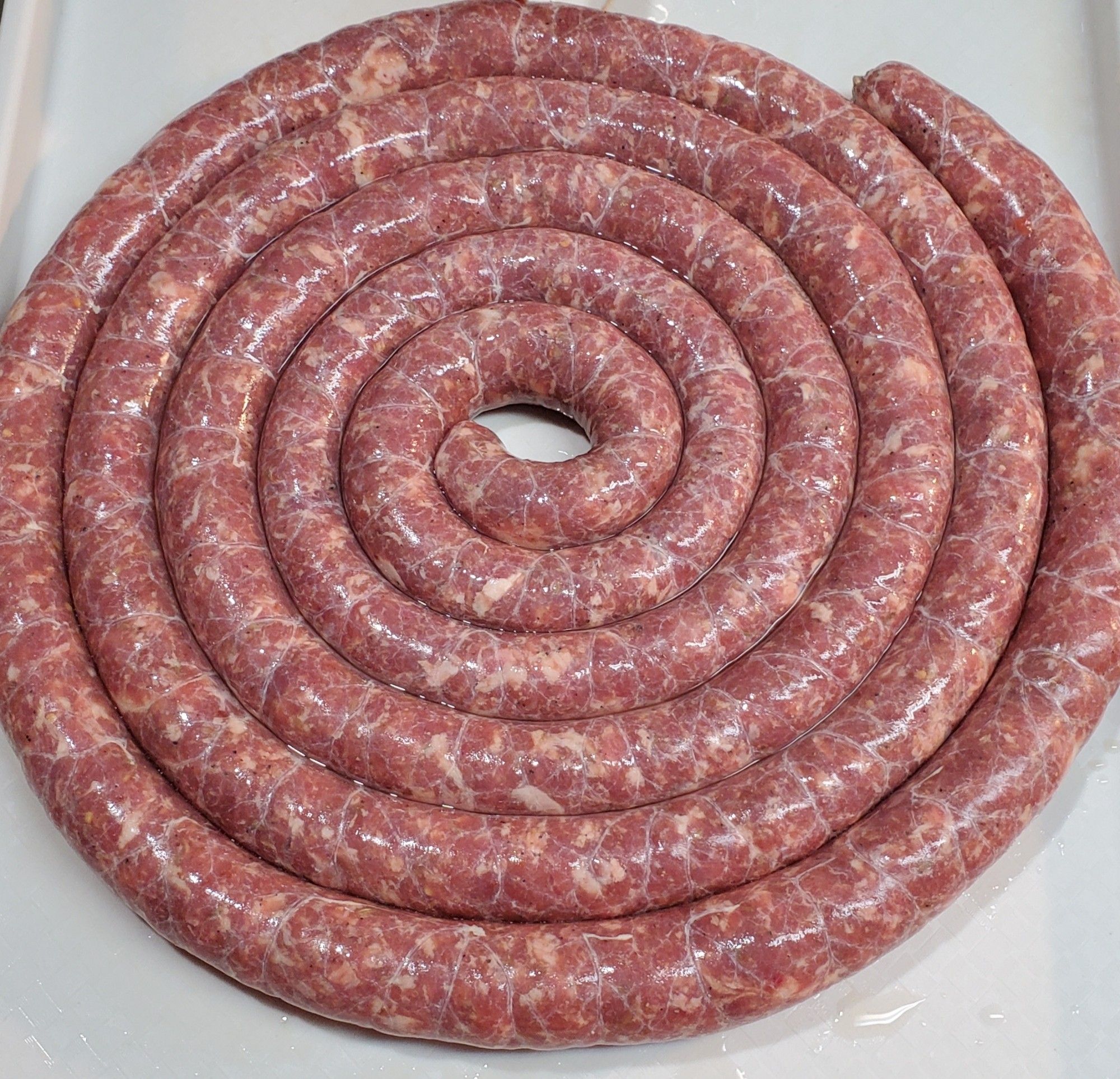 A nine-pound spiral of homemade Italian sausage.