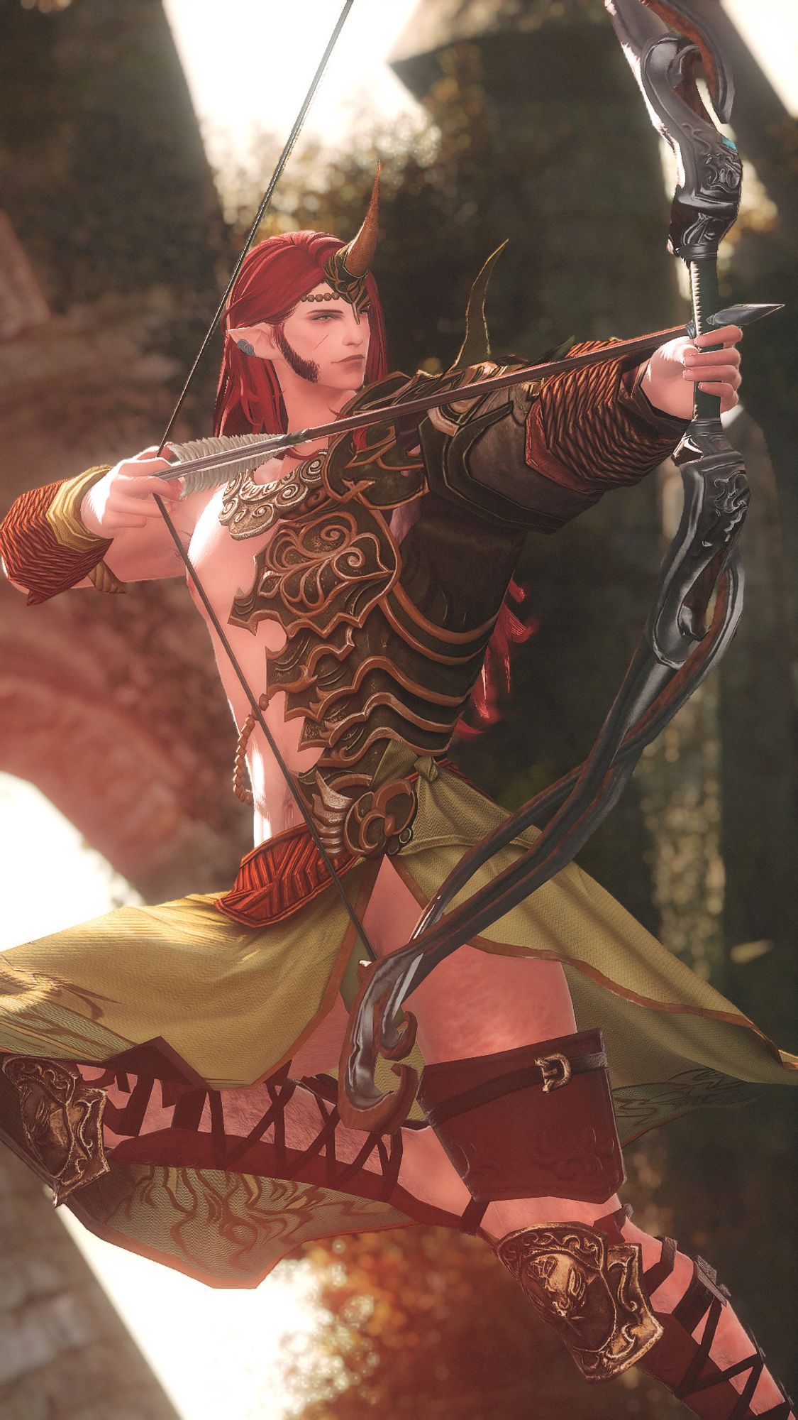 A male elf dressed in green armour with long auburn hair is jumping and firing an arrow from an ornate, wooden bow before ancient ruins lit up by the late afternoon sun.