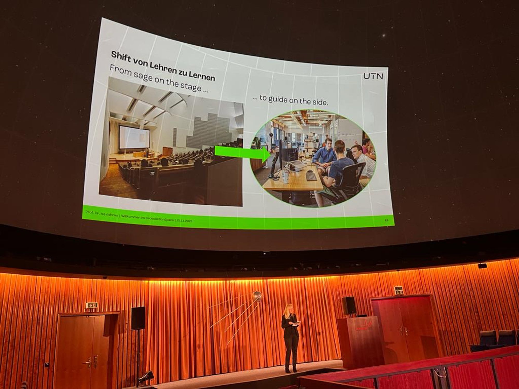 Picture left lecture hall , picture right groups interact - header says from sage on stage to guide on the side